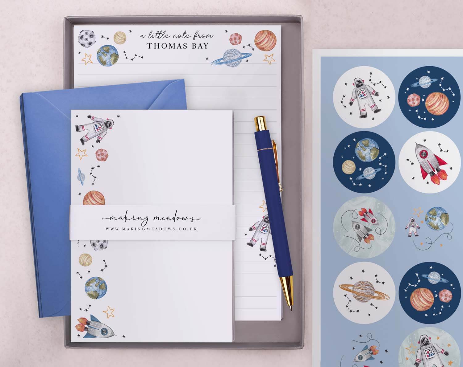 Personalised Stationery featuring space-themed designs and matching envelope.