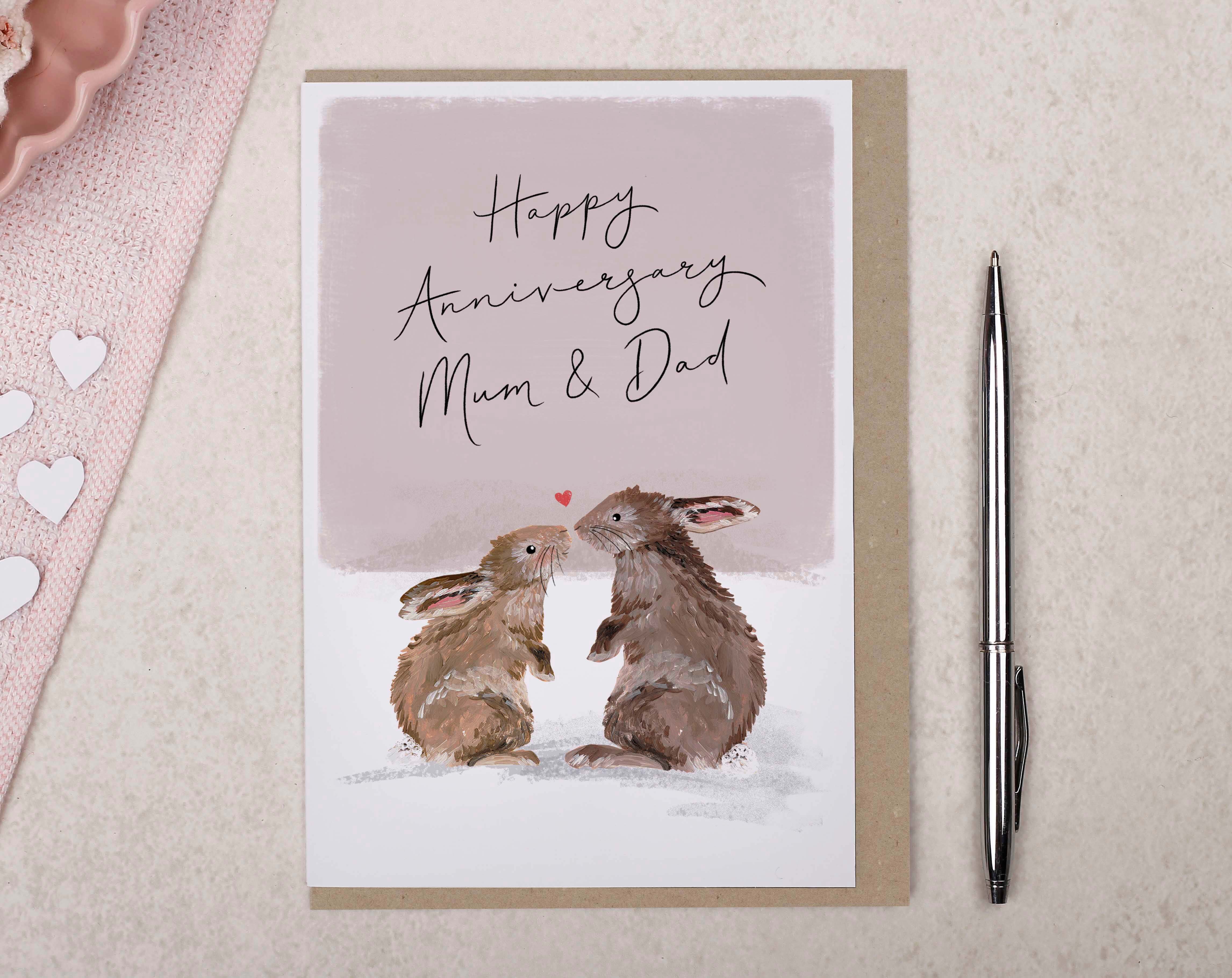 What to Write in an Anniversary Card featuring a bunny illustration for Mum and Dad's anniversary.