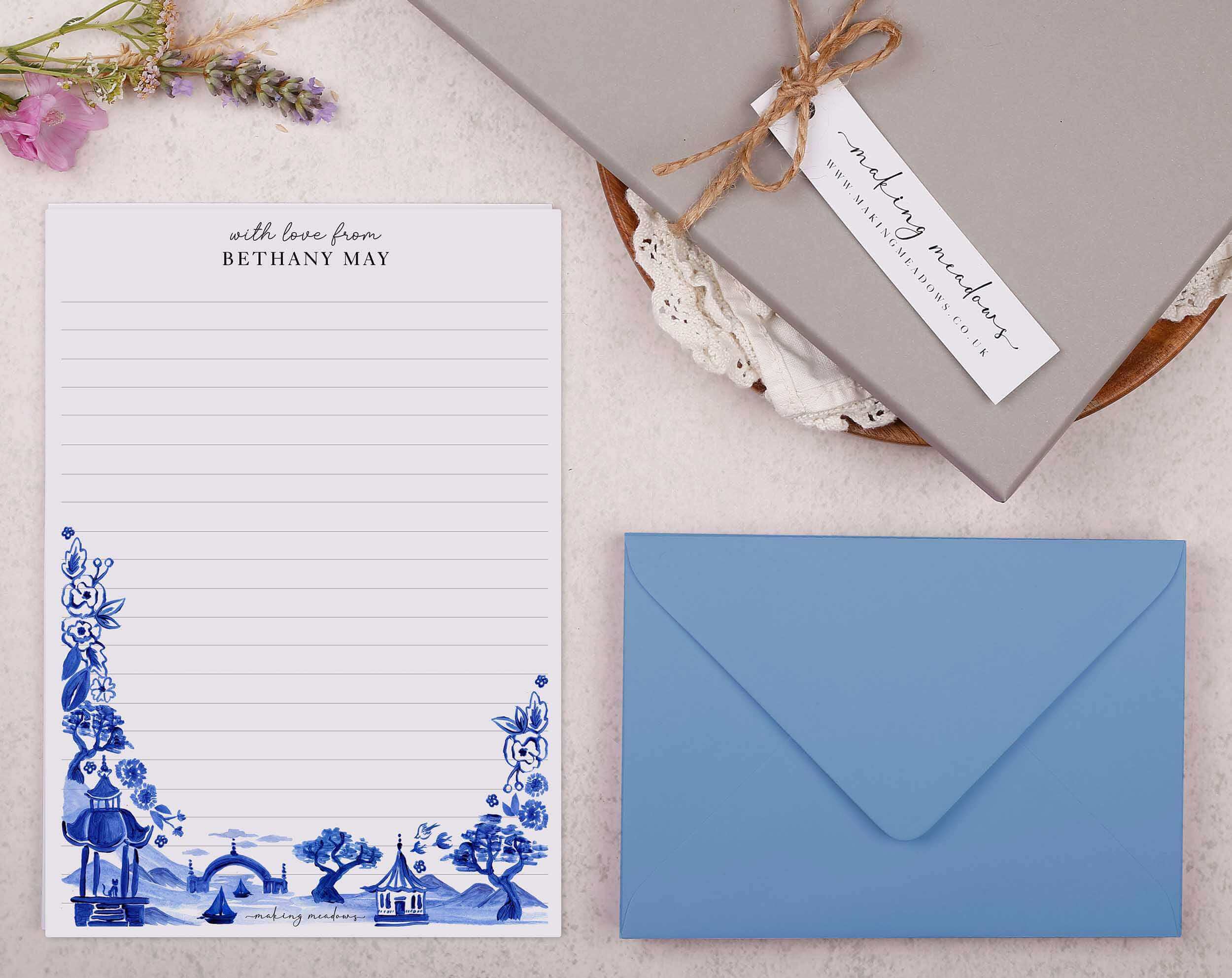 How to Find a Pen Pal themed stationery with blue envelope and floral design, perfect for writing letters.