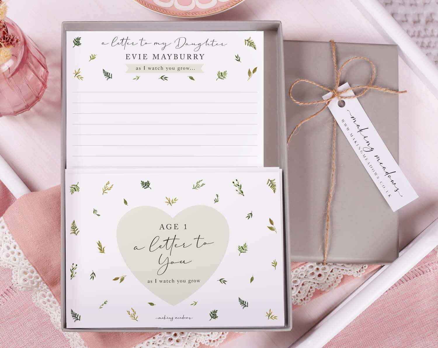 As You Grow Letters for your children displayed in a beautifully designed box with writing pages.