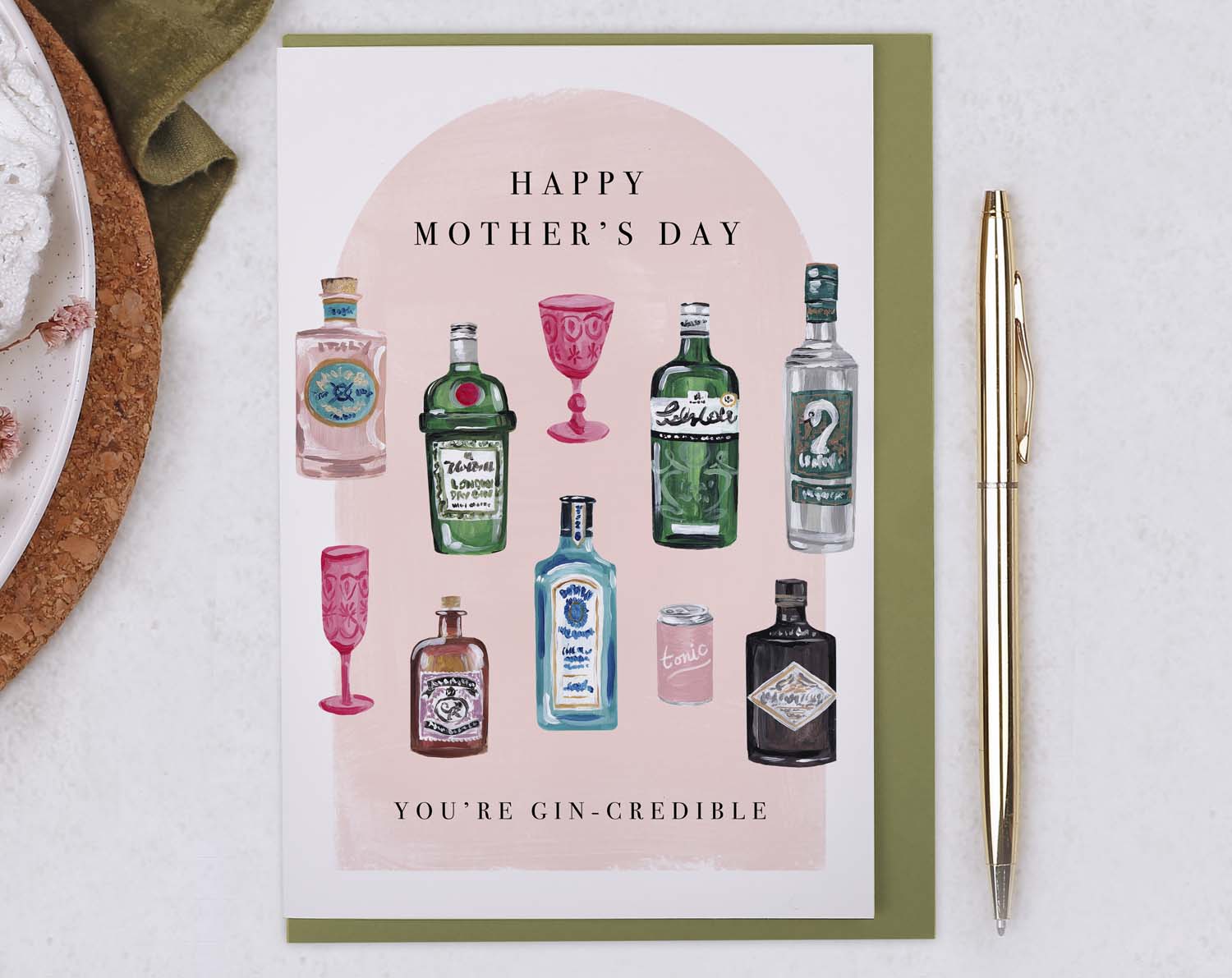 What to Write in Mothers Day Card featuring a gin-themed card with vintage cocktail bottles and festive text.