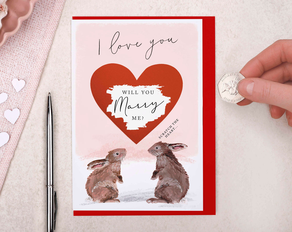 Will You Marry Me Cards featuring cute rabbits and a heart design for a surprise scratch to reveal proposal.