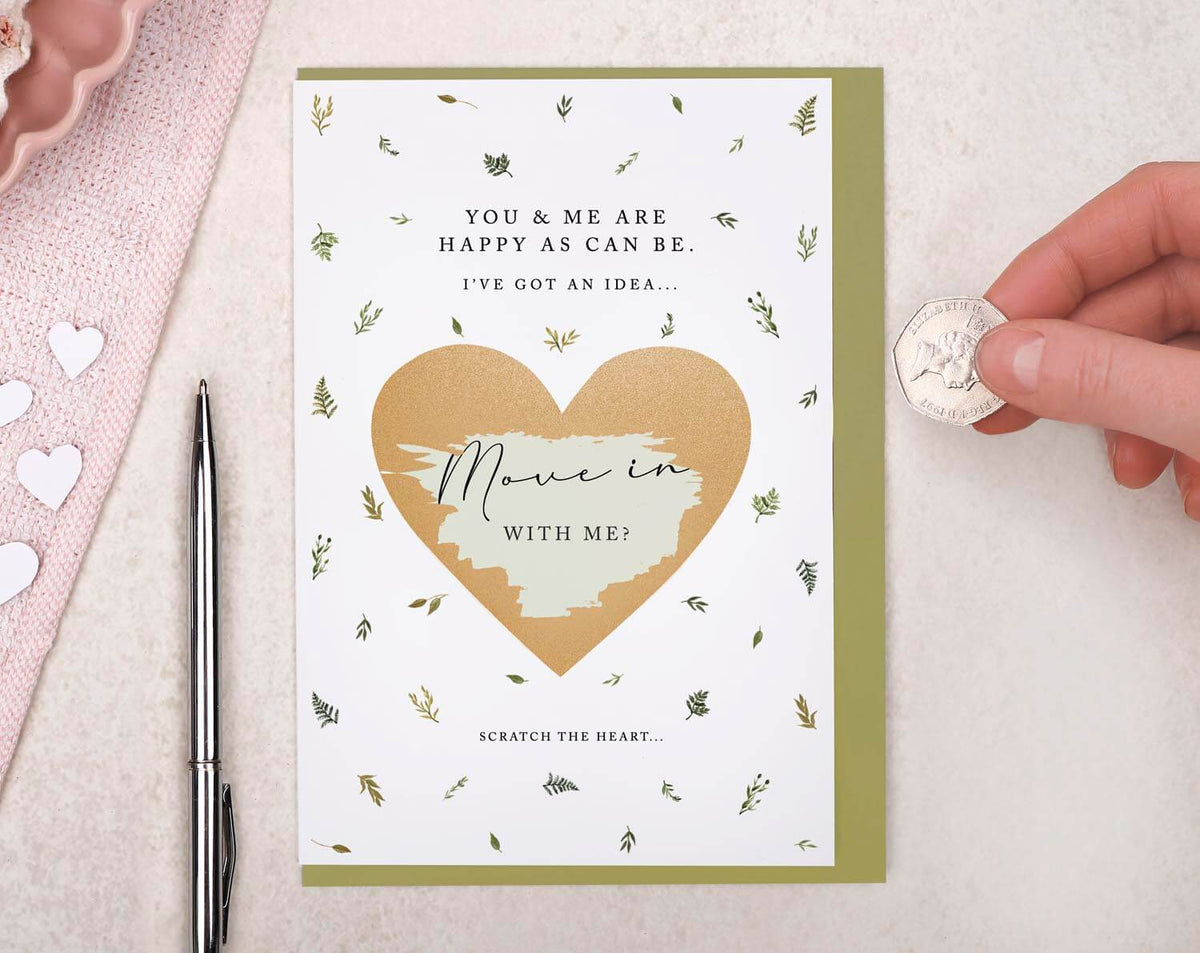 Occassion Scratch Cards featuring a scratch heart panel asking to move in together.