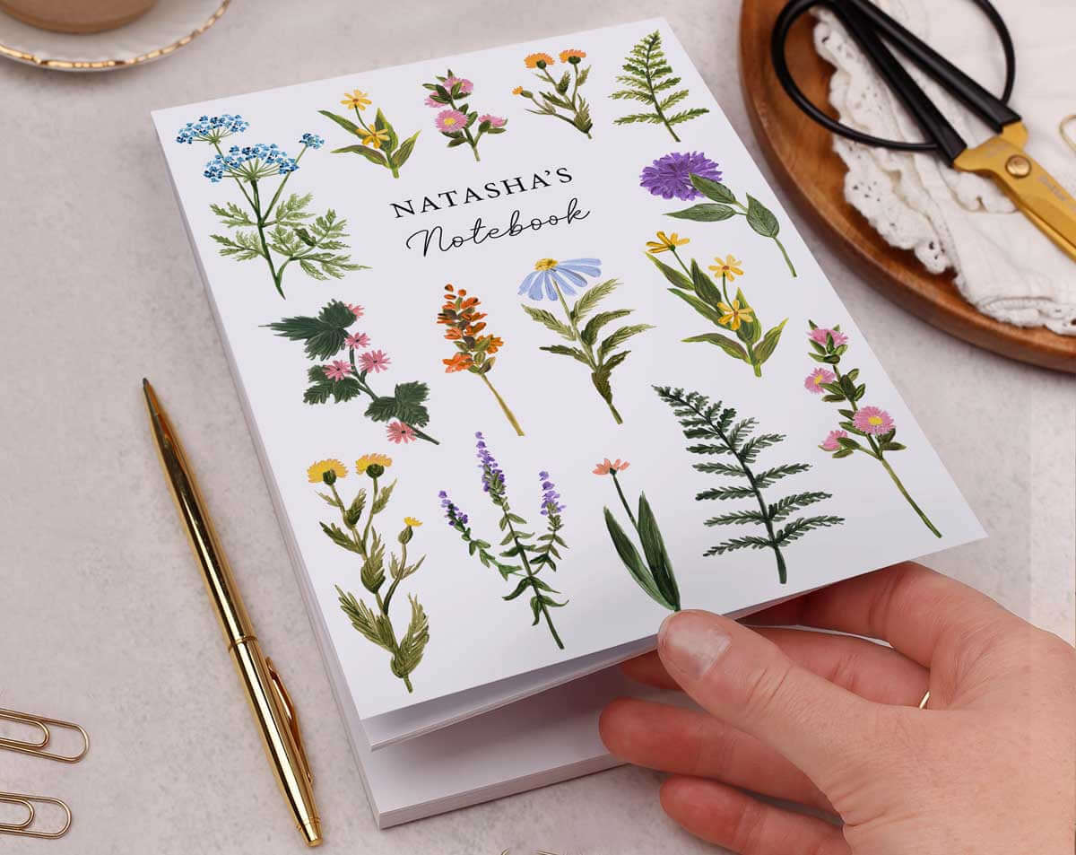Personalised Notebooks with floral design and name Natasha's on the cover