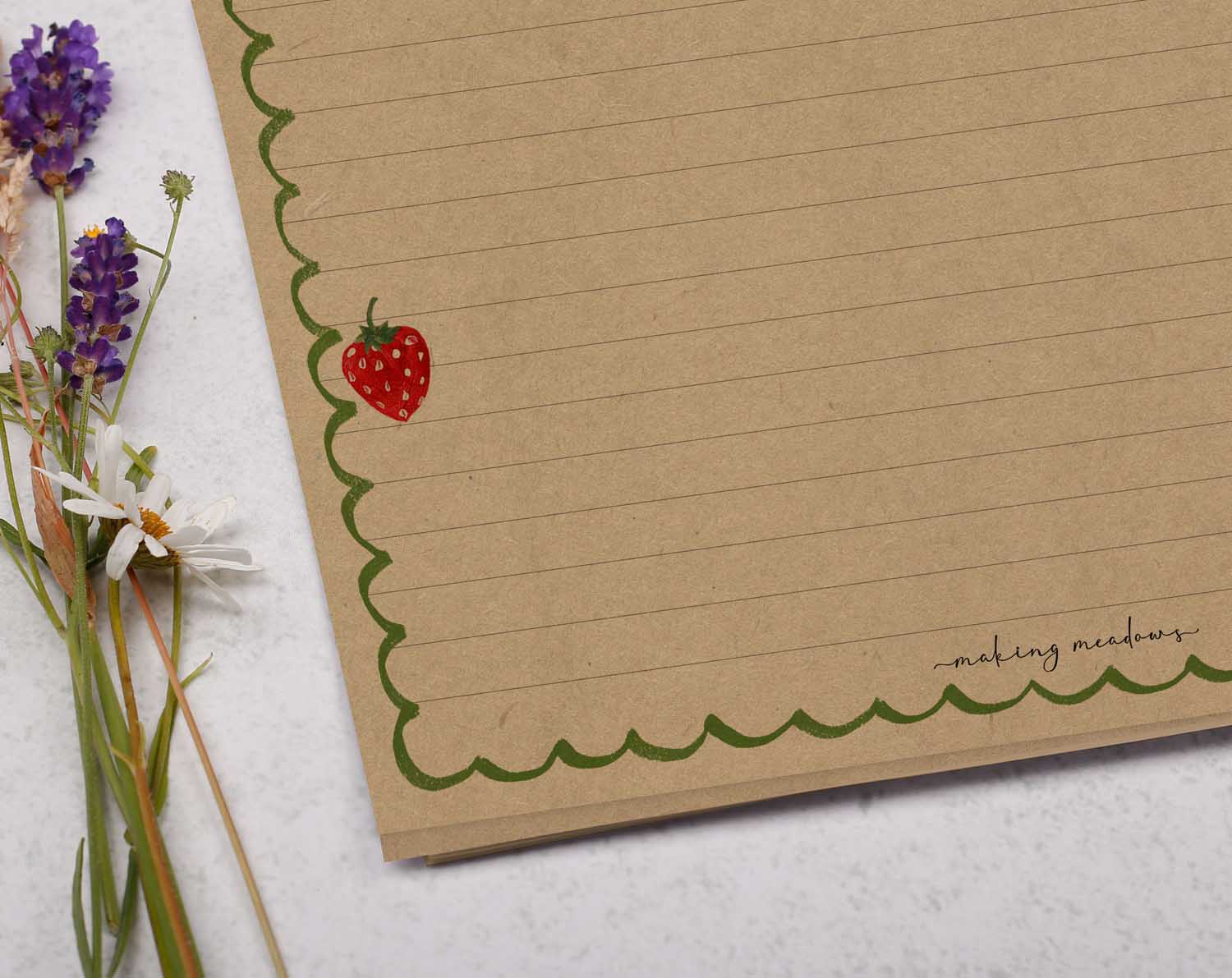 A4 kraft writing paper with a strawberry scalloped edge. Stationery designed by Making Meadows
