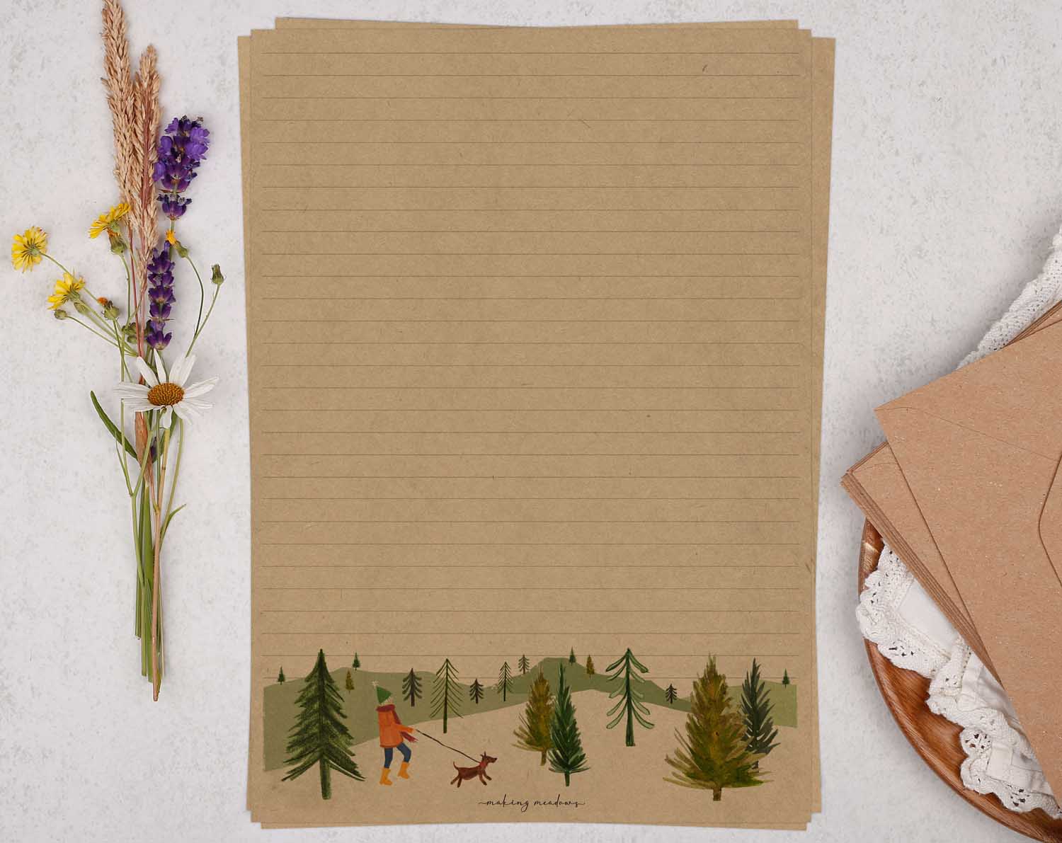 A4 kraft writing paper with dog walker. Stationery designed by Making Meadows