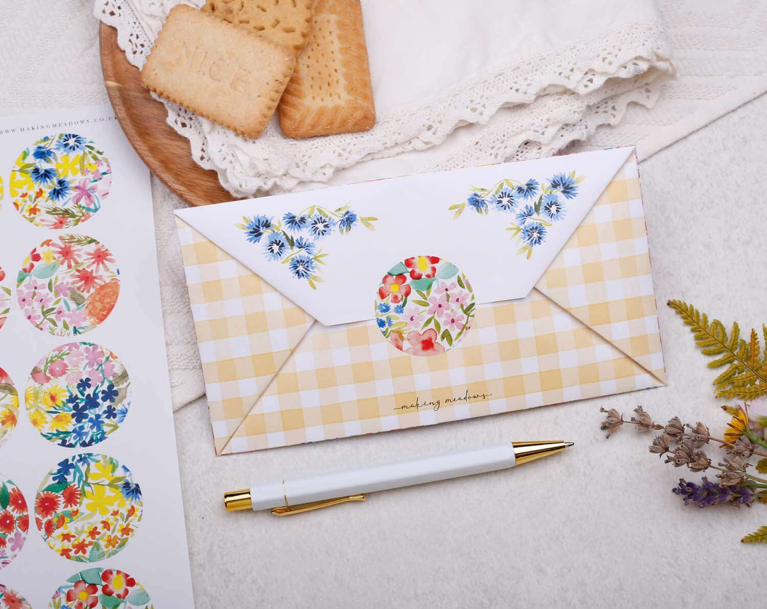 A4 origami writing paper with watercolor flowers, folded into a decorative envelope with stickers and a pen.