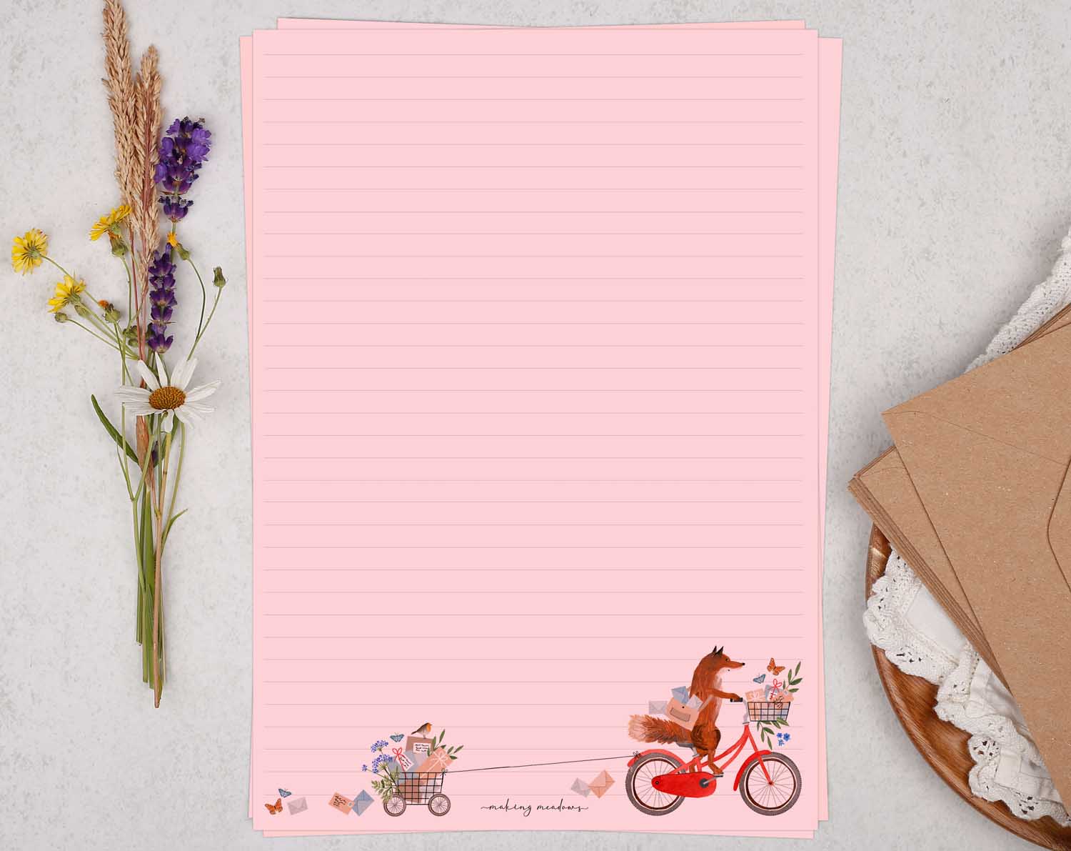 A4 pink writing paper with fox on bicycle. Stationery designed by Making Meadows