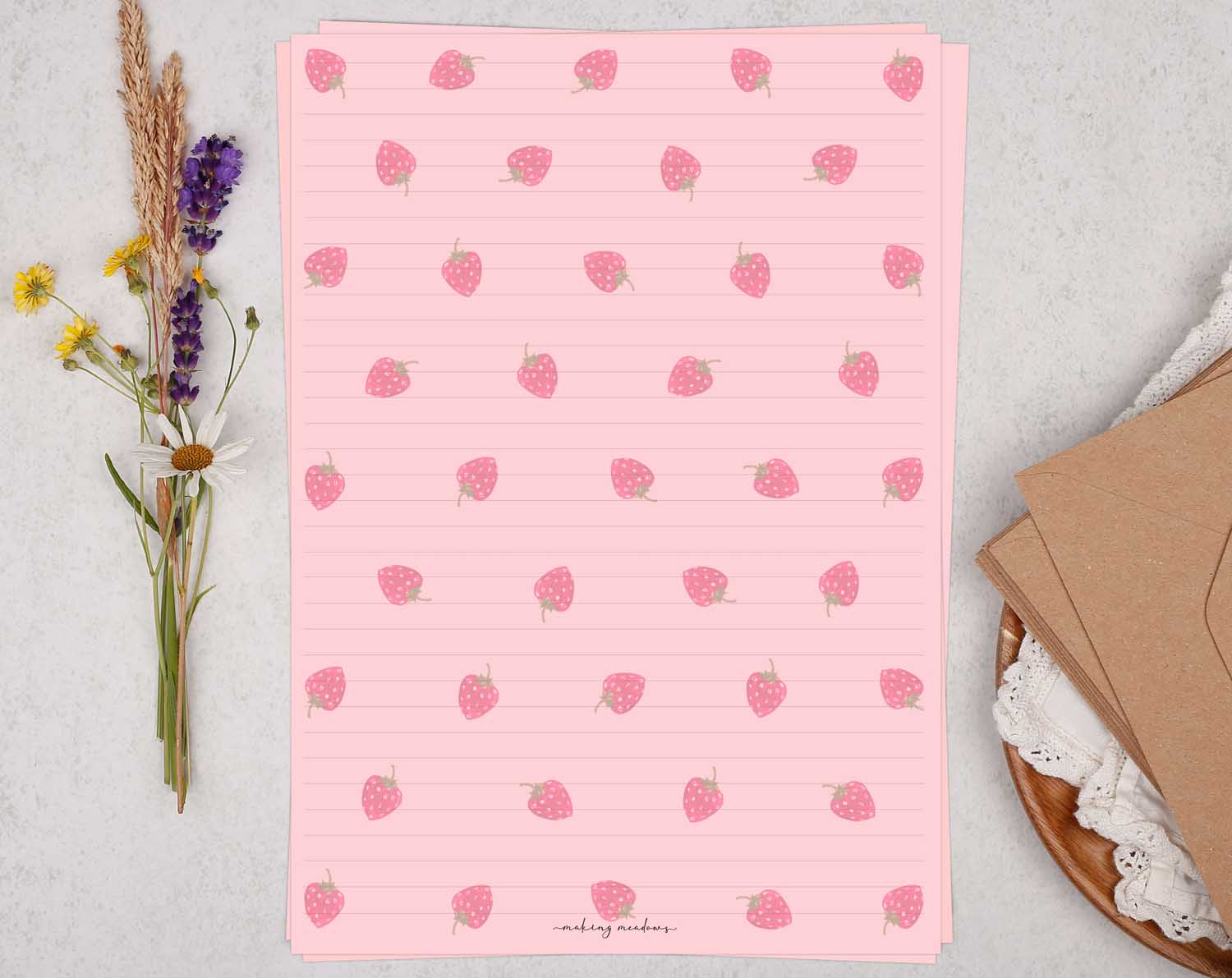 A4 pink writing paper with strawberry pattern. Stationery designed by Making Meadows