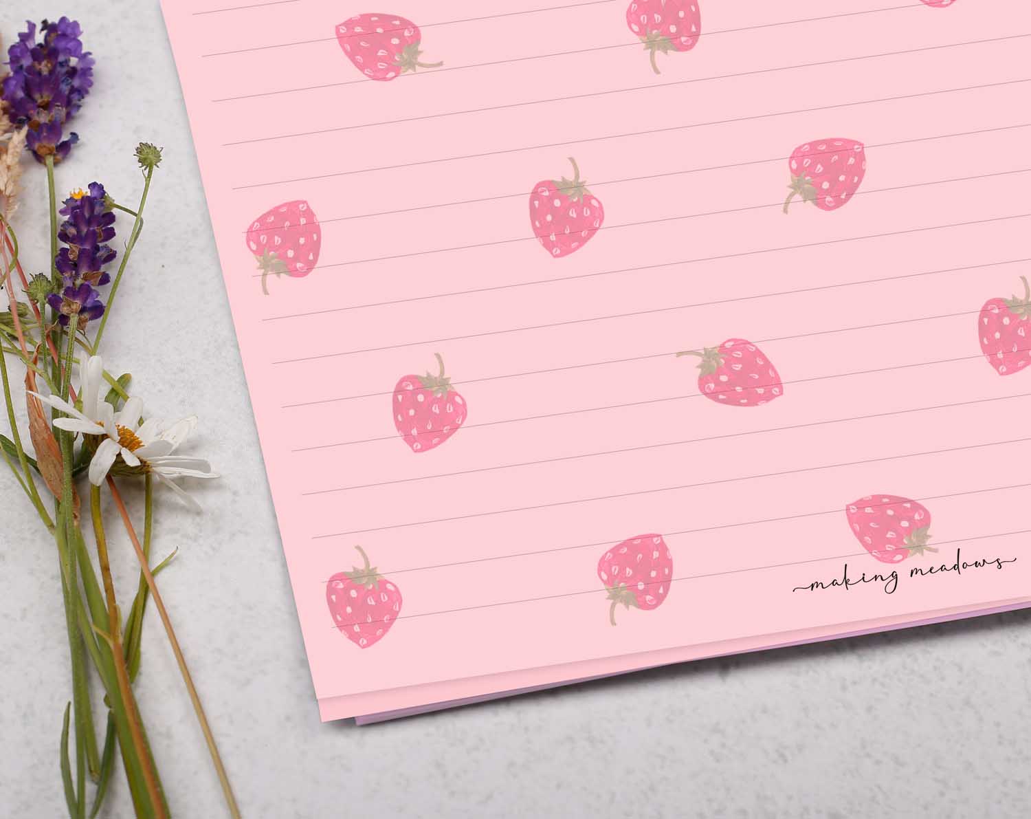A4 pink writing paper with strawberry pattern. Stationery designed by Making Meadows