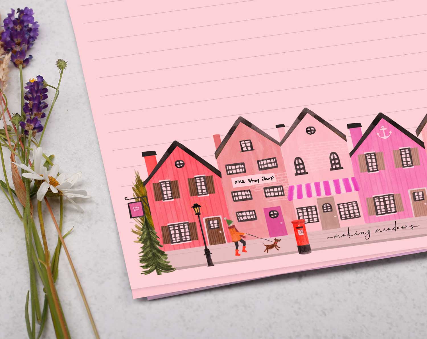 A4 pink writing paper with village shops. Stationery designed by Making Meadows