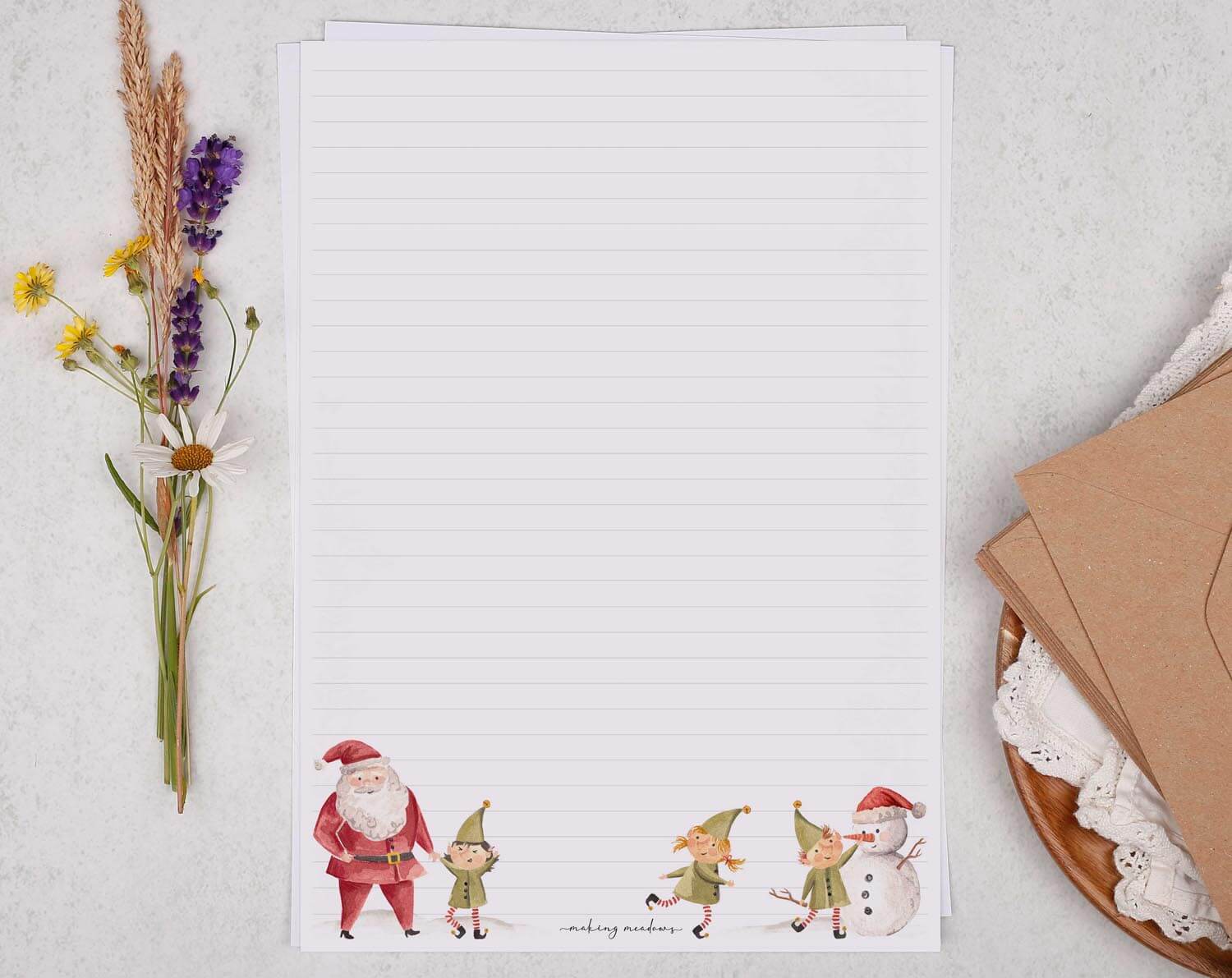 A4 writing paper with Christmas Santa and Elves. Stationery designed by Making Meadows