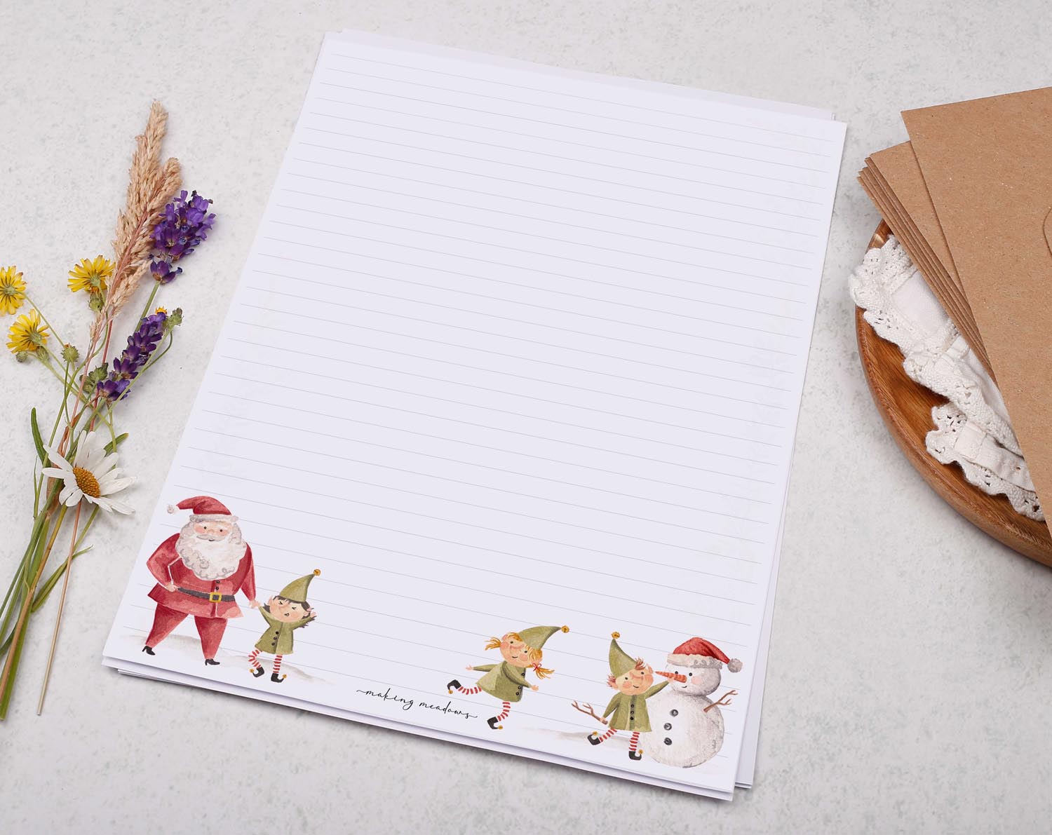 A4 writing paper with Christmas Santa and Elves. Stationery designed by Making Meadows