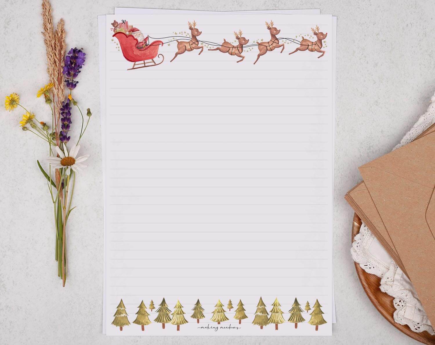 A4 writing paper with Christmas Santa on sleigh. Stationery designed by Making Meadows