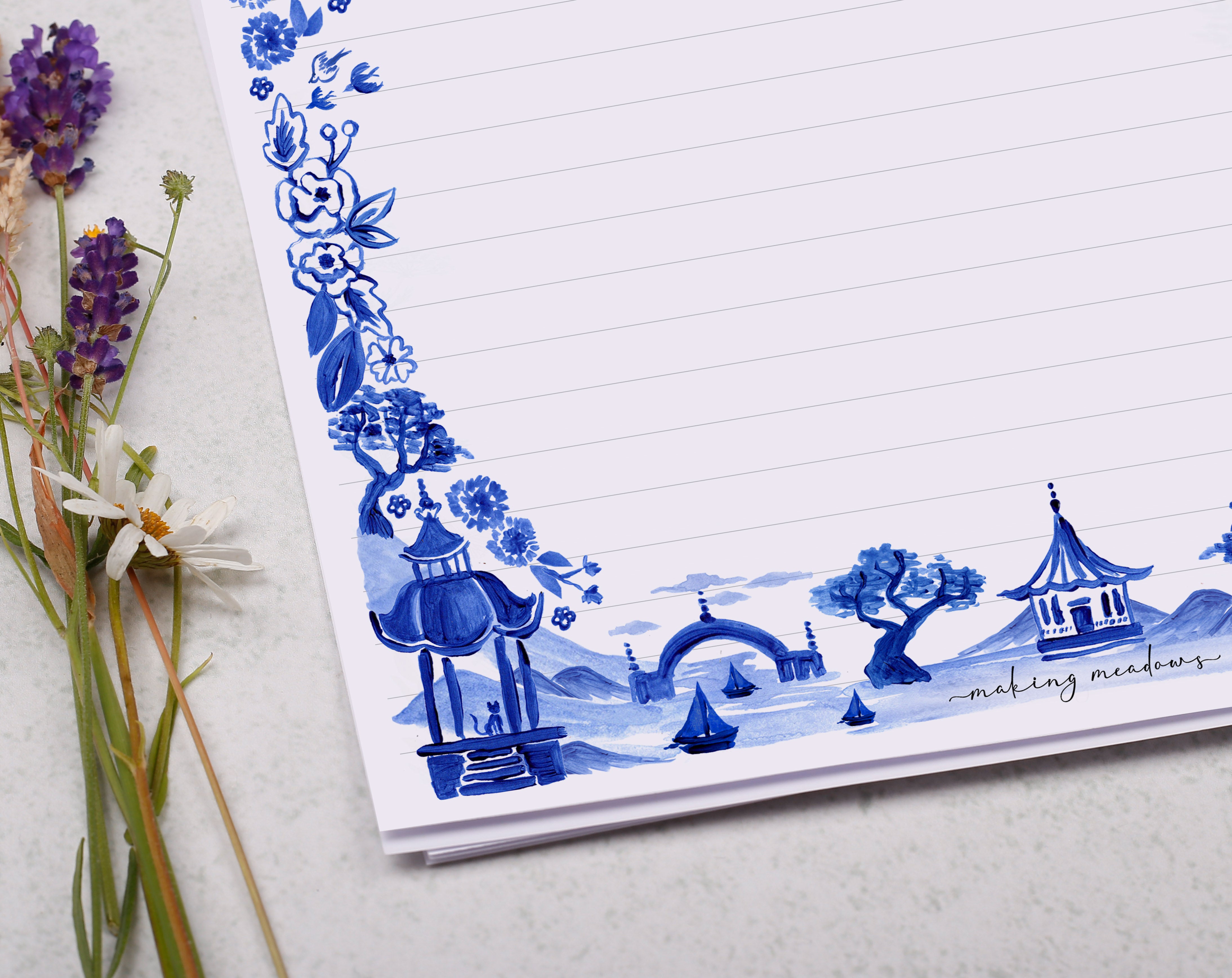 A4 writing paper with a blue Japanese landscape. Stationery designed by Making Meadows