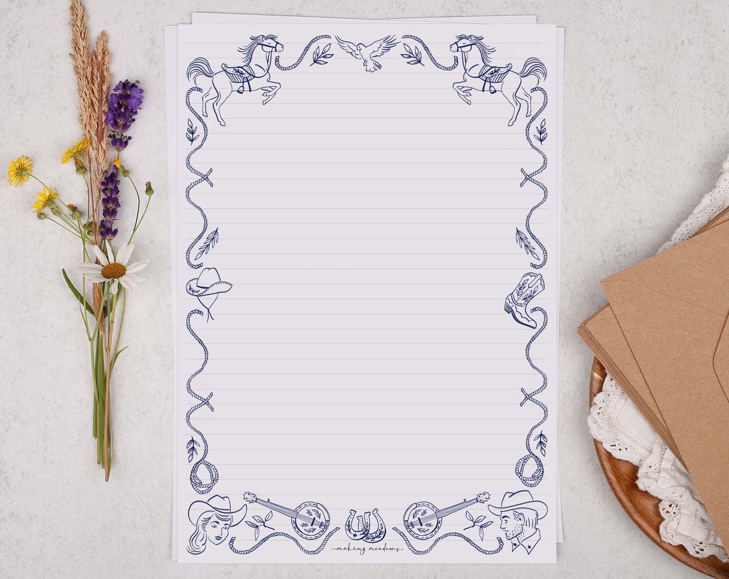 A4 writing paper with a blue cowboy border. Stationery designed by Making Meadows