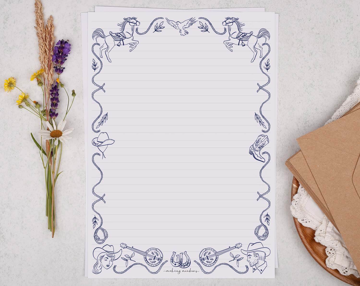 A4 writing paper with a blue cowboy border. Stationery designed by Making Meadows