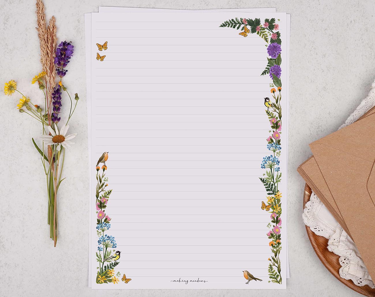 A4 writing paper with a ditsy floral meadow border. Stationery designed by Making Meadows