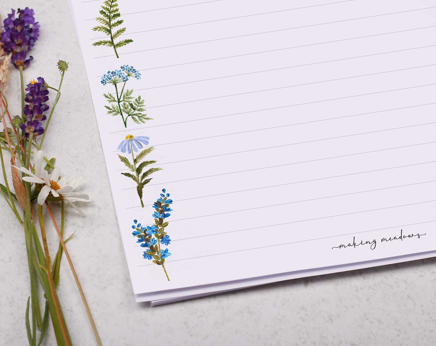A4 writing paper with blue flower border. Stationery designed by Making Meadows