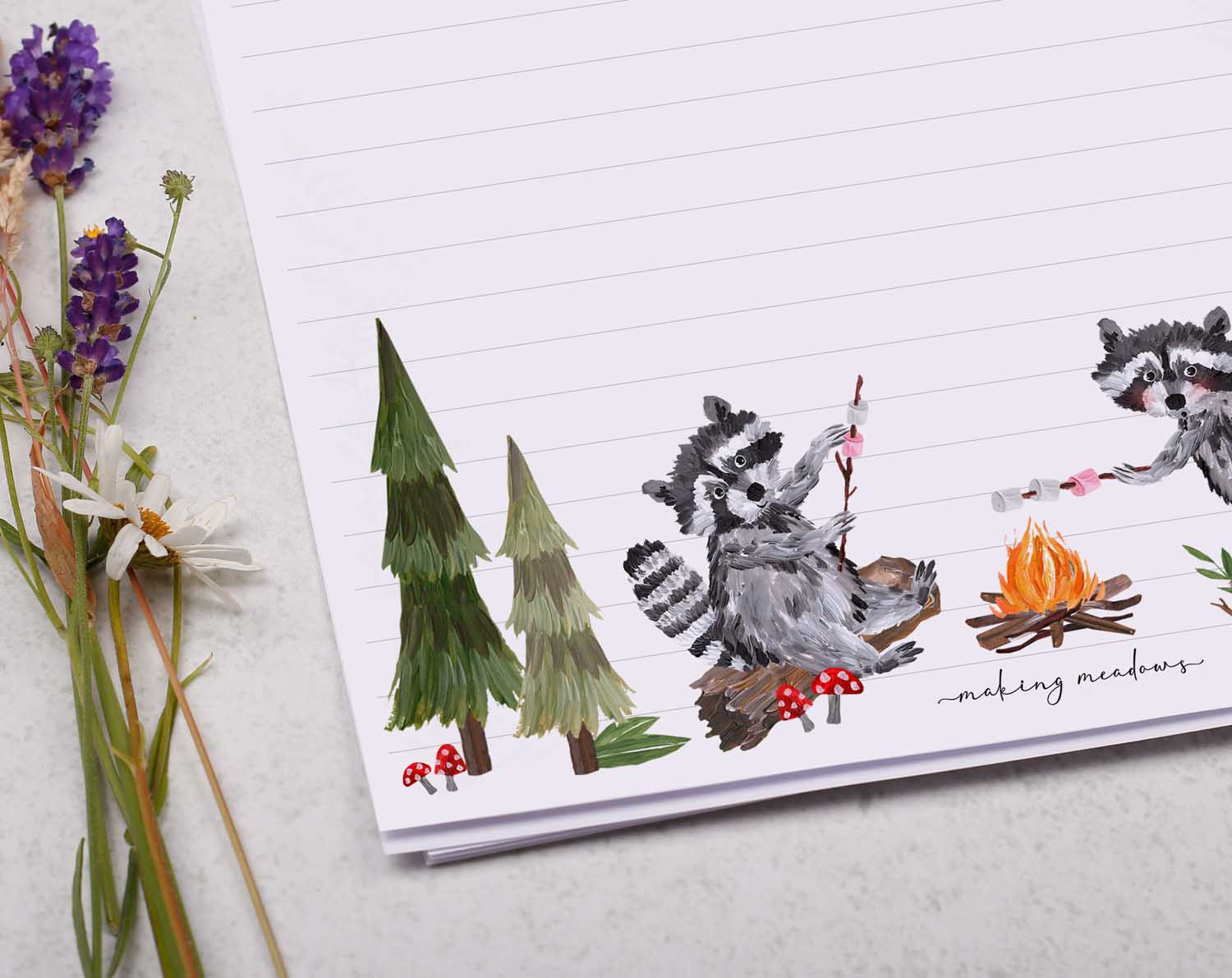 A4 writing paper with camping raccoons. Stationery designed by Making Meadows