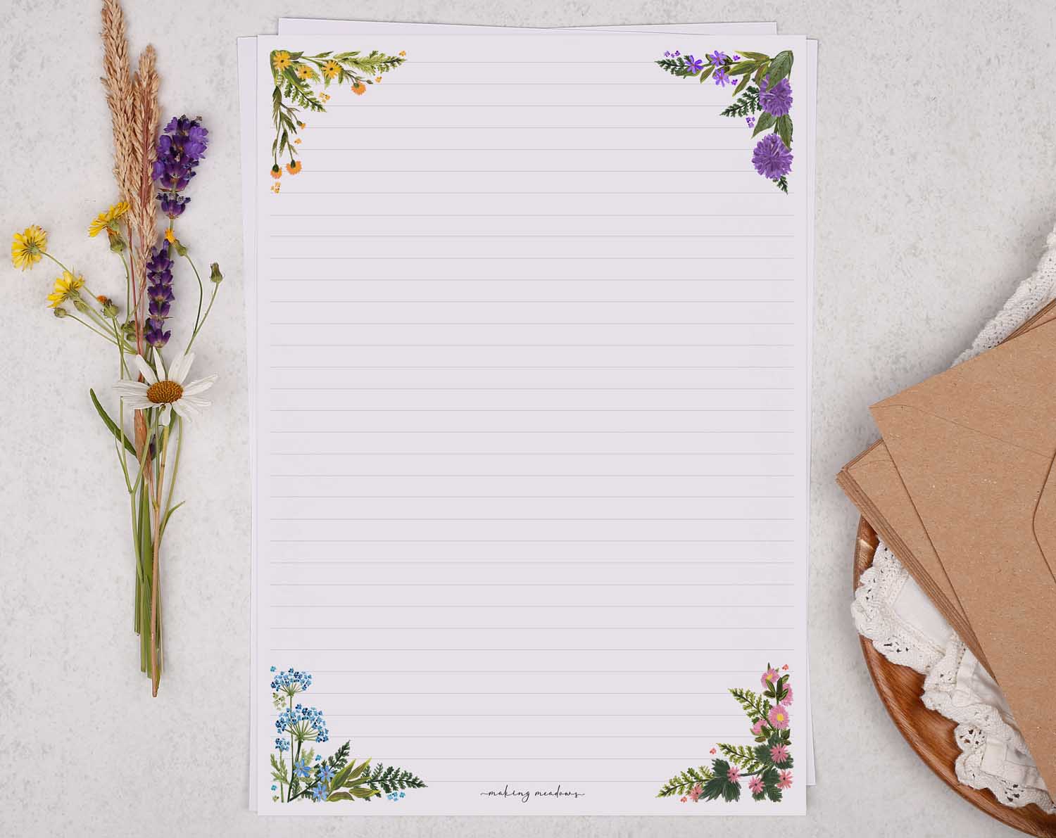 A4 writing paper with floral corners. Stationery designed by Making Meadows