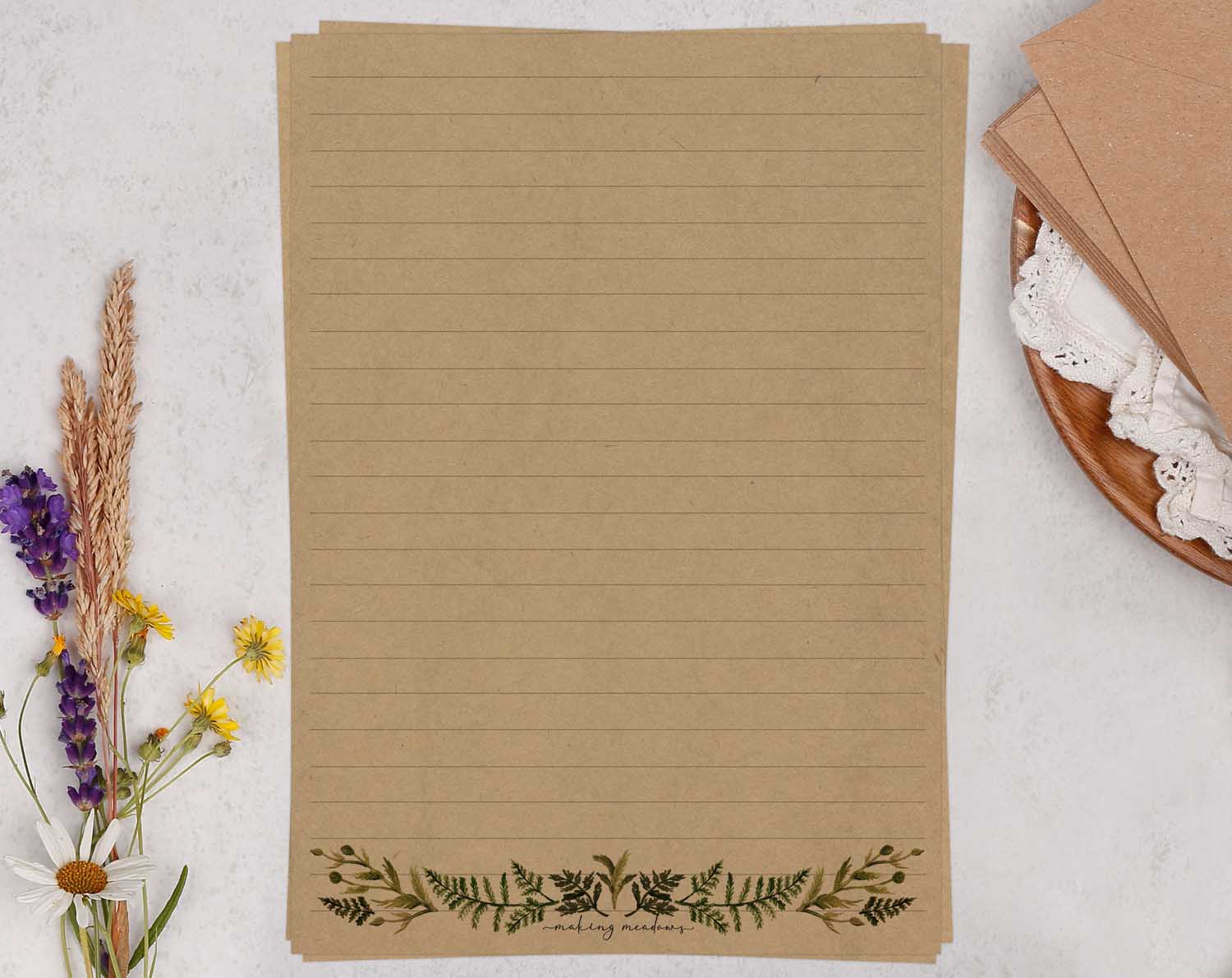 A5 kraft writing paper with botanical edge. Stationery designed by Making Meadows