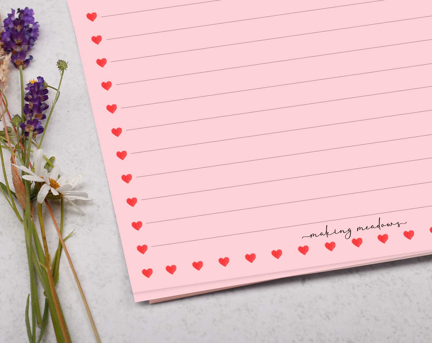 A5 pink writing paper with ditsy hearts. Stationery designed by Making Meadows