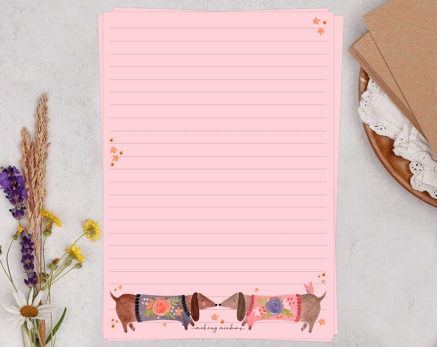 A5 pink writing paper with sausage dogs. Stationery designed by Making Meadows
