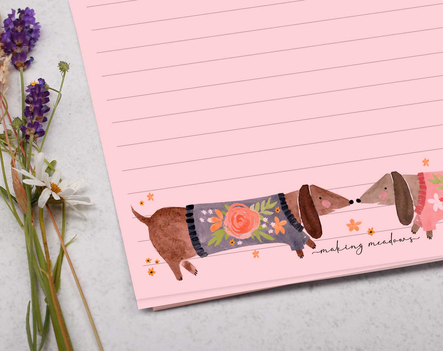 A5 pink writing paper with sausage dogs. Stationery designed by Making Meadows