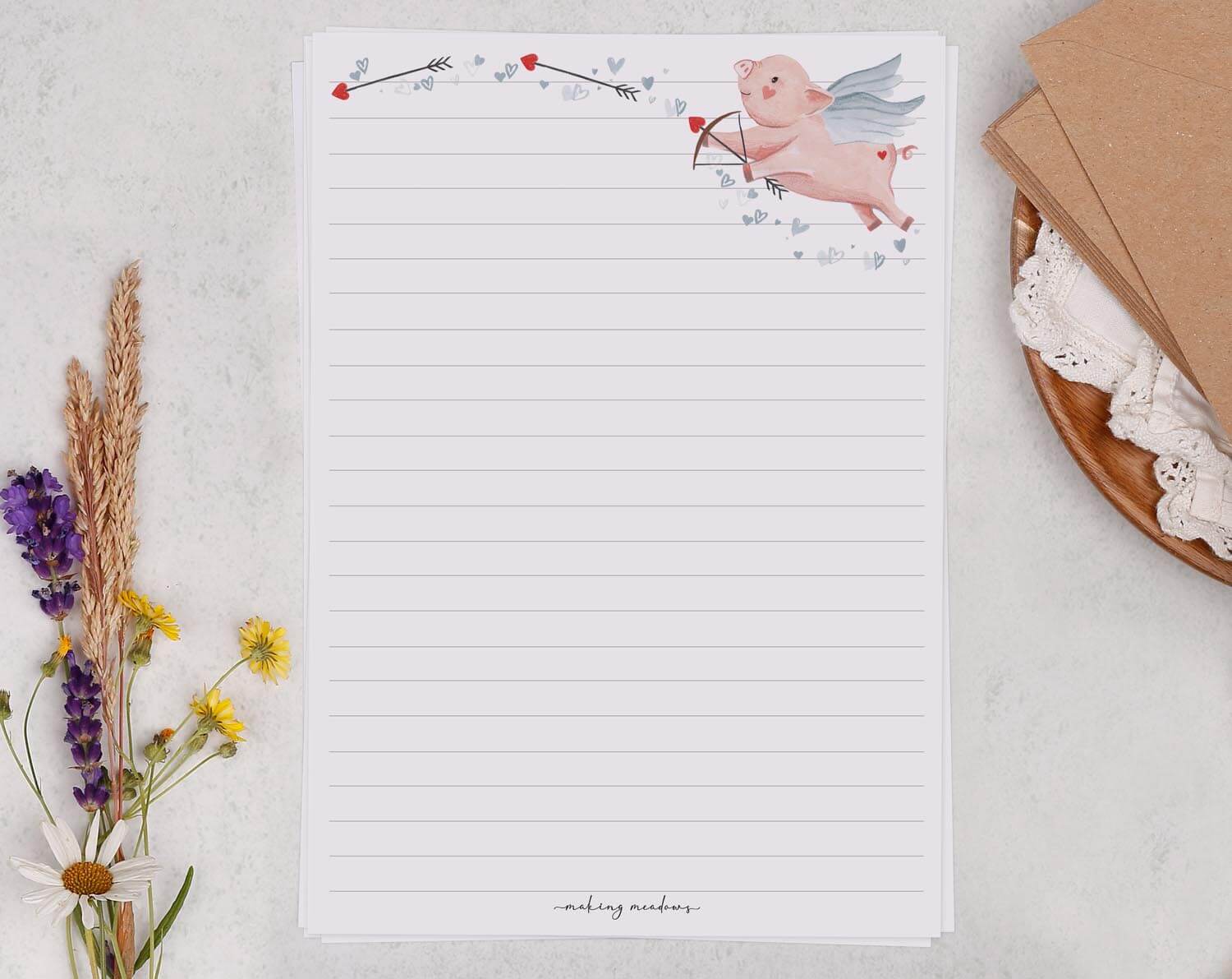 A5 writing paper with cupid pig. Stationery designed by Making Meadows