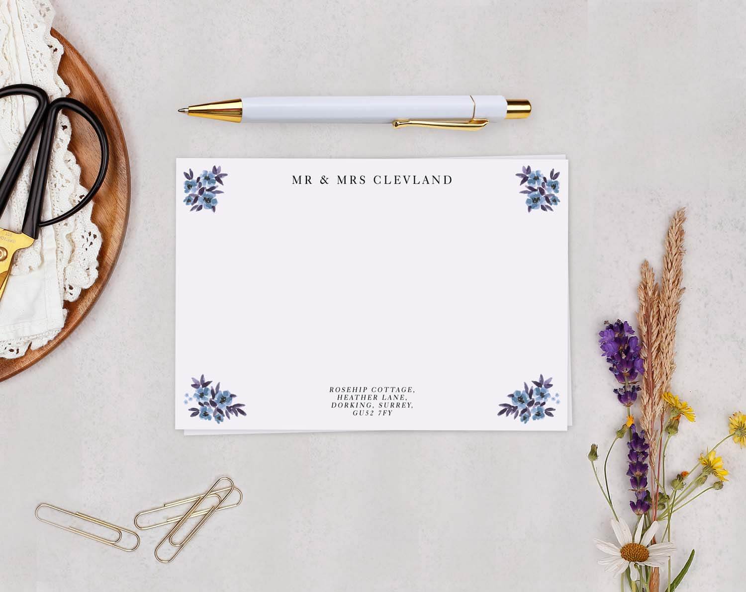 Blue flower Personalised Note cards designed for Mr & Mrs Cleveland with elegant floral accents.