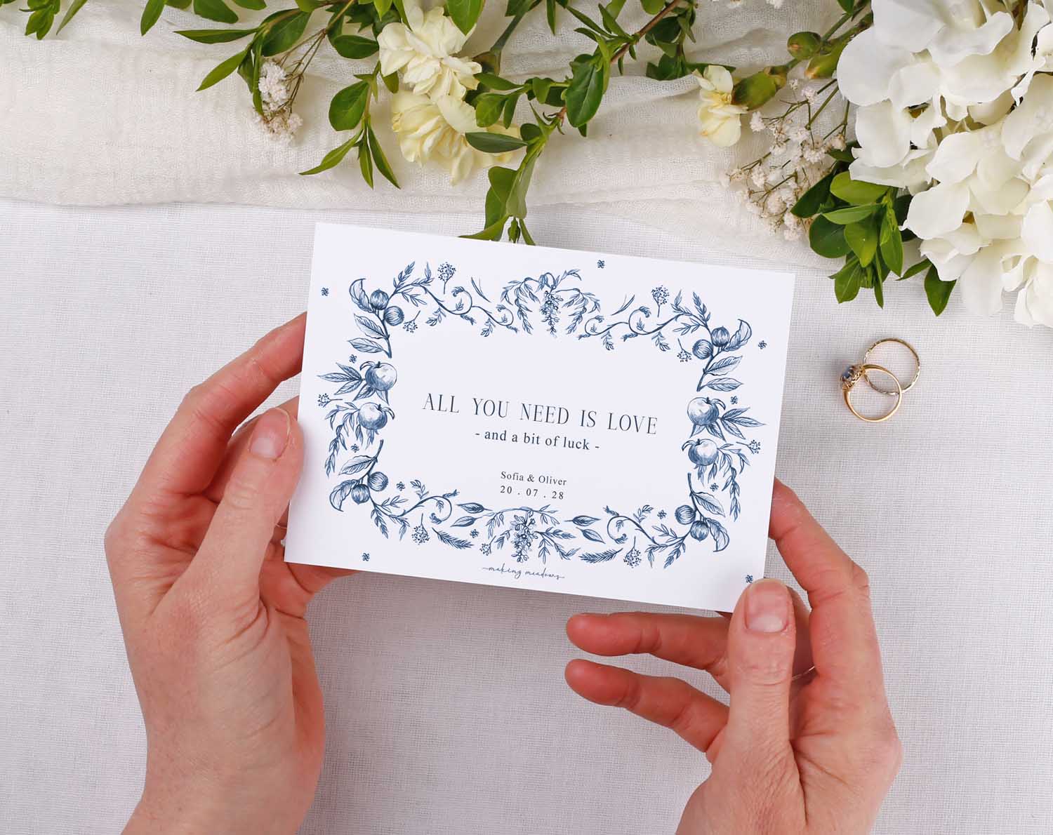 Blue Garden Scratch Card Envelopes adorned with floral design, personalized for wedding favours with names and wedding date.