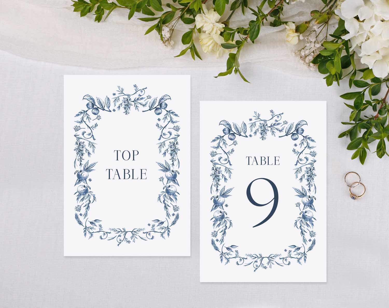 Blue Garden Wedding Table Numbers featuring delicate navy blue botanicals for elegant seating arrangements.