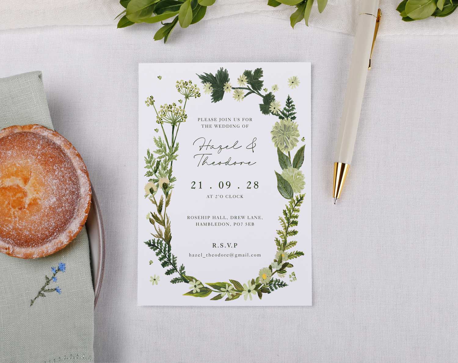 Botanical Wedding Invitations featuring greenery design and elegant text for a wedding announcement.