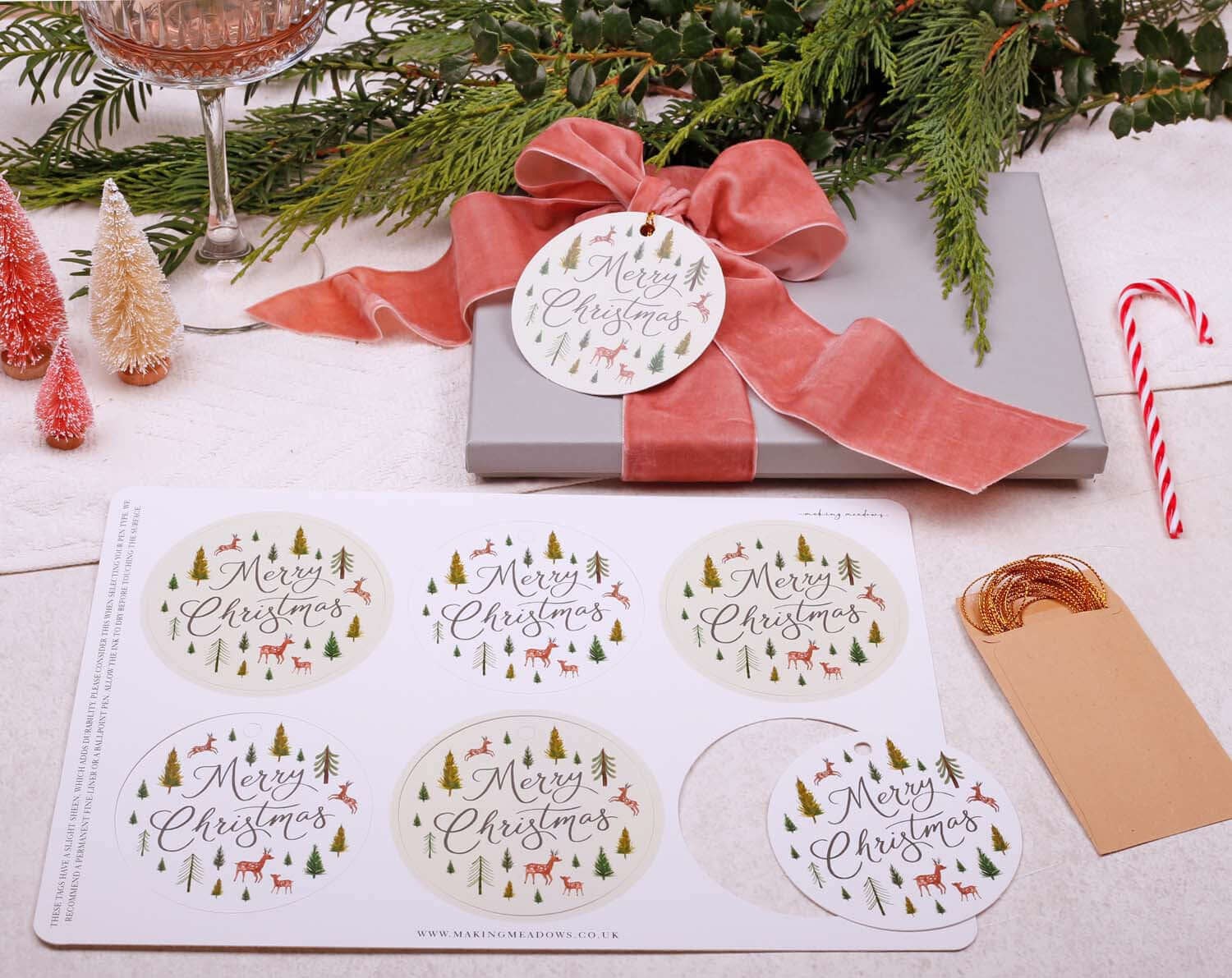 Rustic Christmas Gift Tags in a festive display with woodland designs, perfect for holiday gift wrapping.