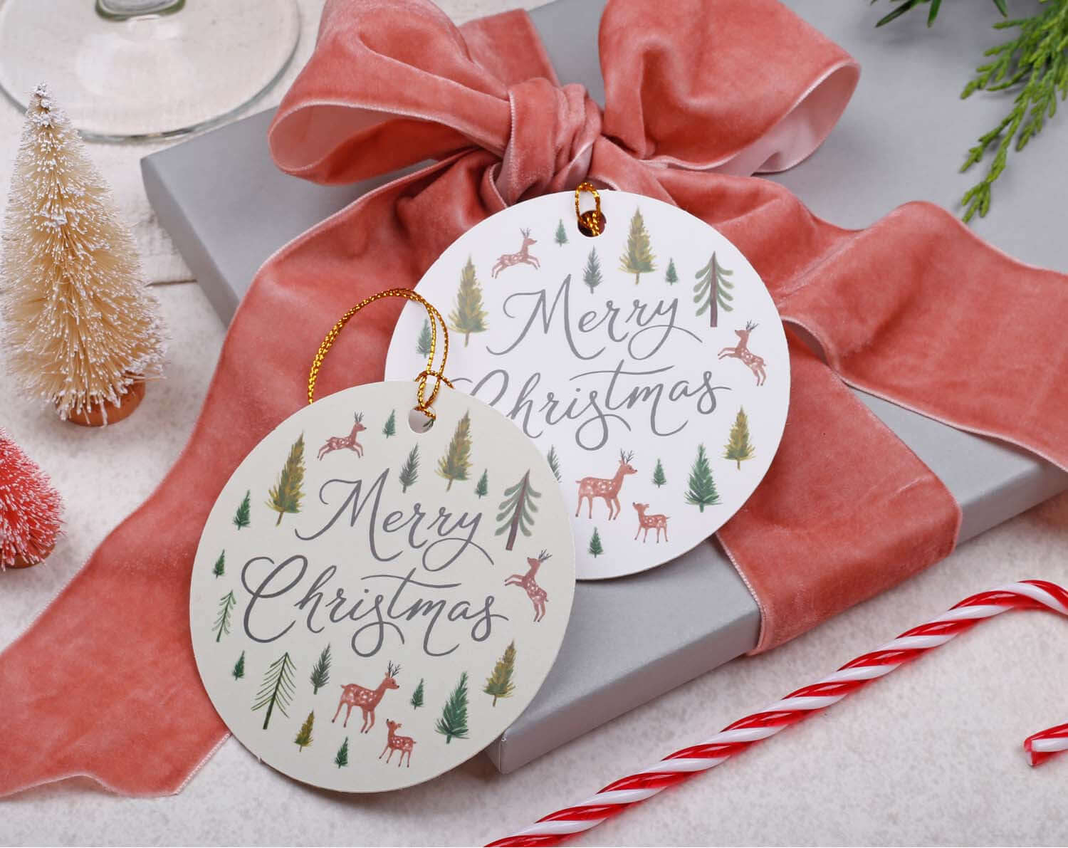 Rustic Christmas Gift Tags - 12 Pack featuring woodland illustrations and festive designs on kraft-inspired card.