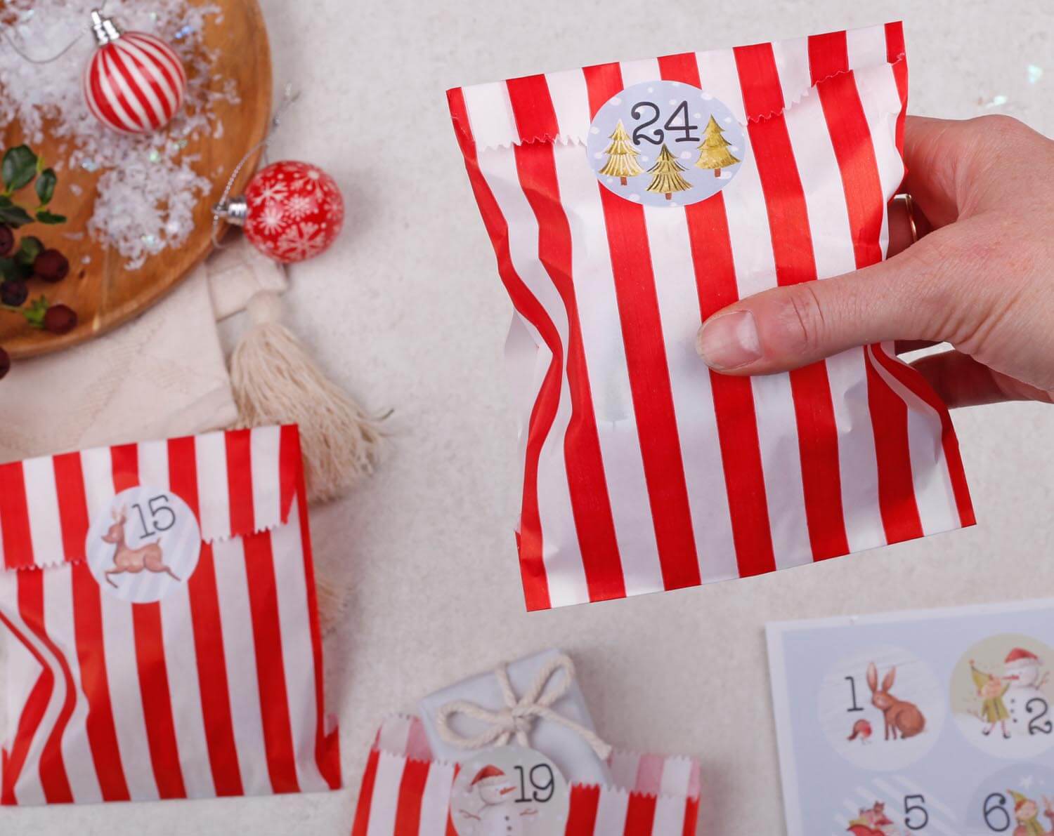 Elf Christmas Advent Calendar With Red Bags. Advent Calendars designed by Making Meadows