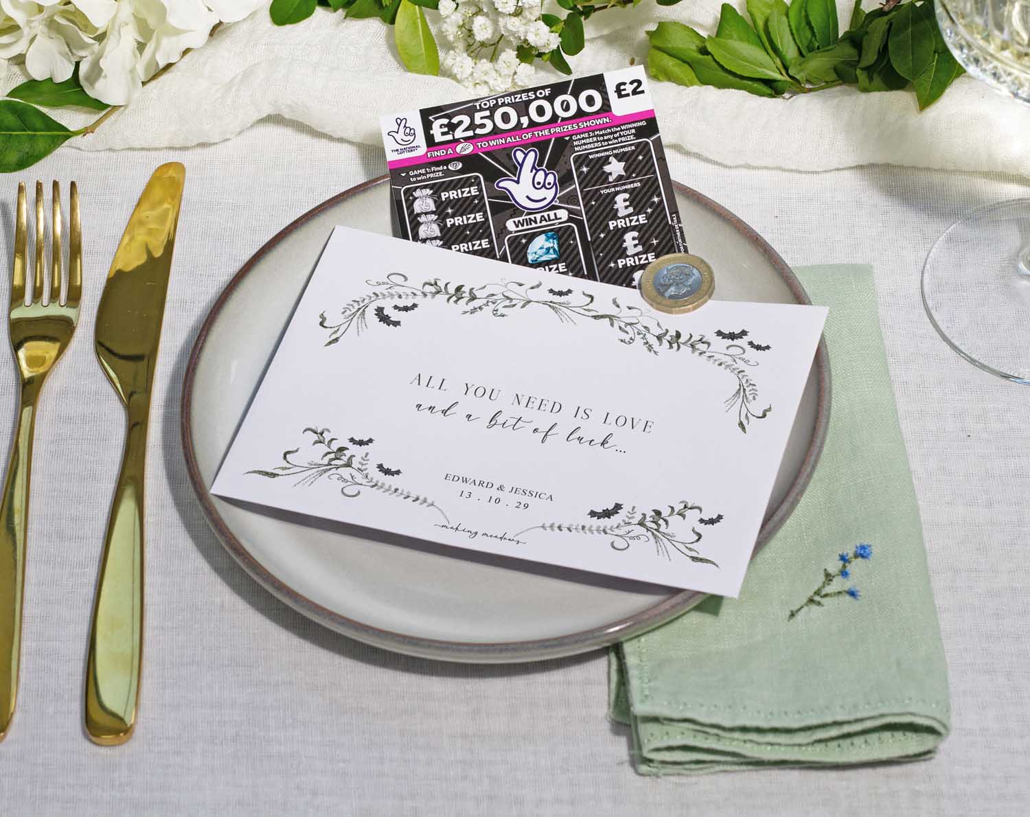 Gothic Scratch Card Envelopes on a wedding table setting with scratch card and decorative plate.