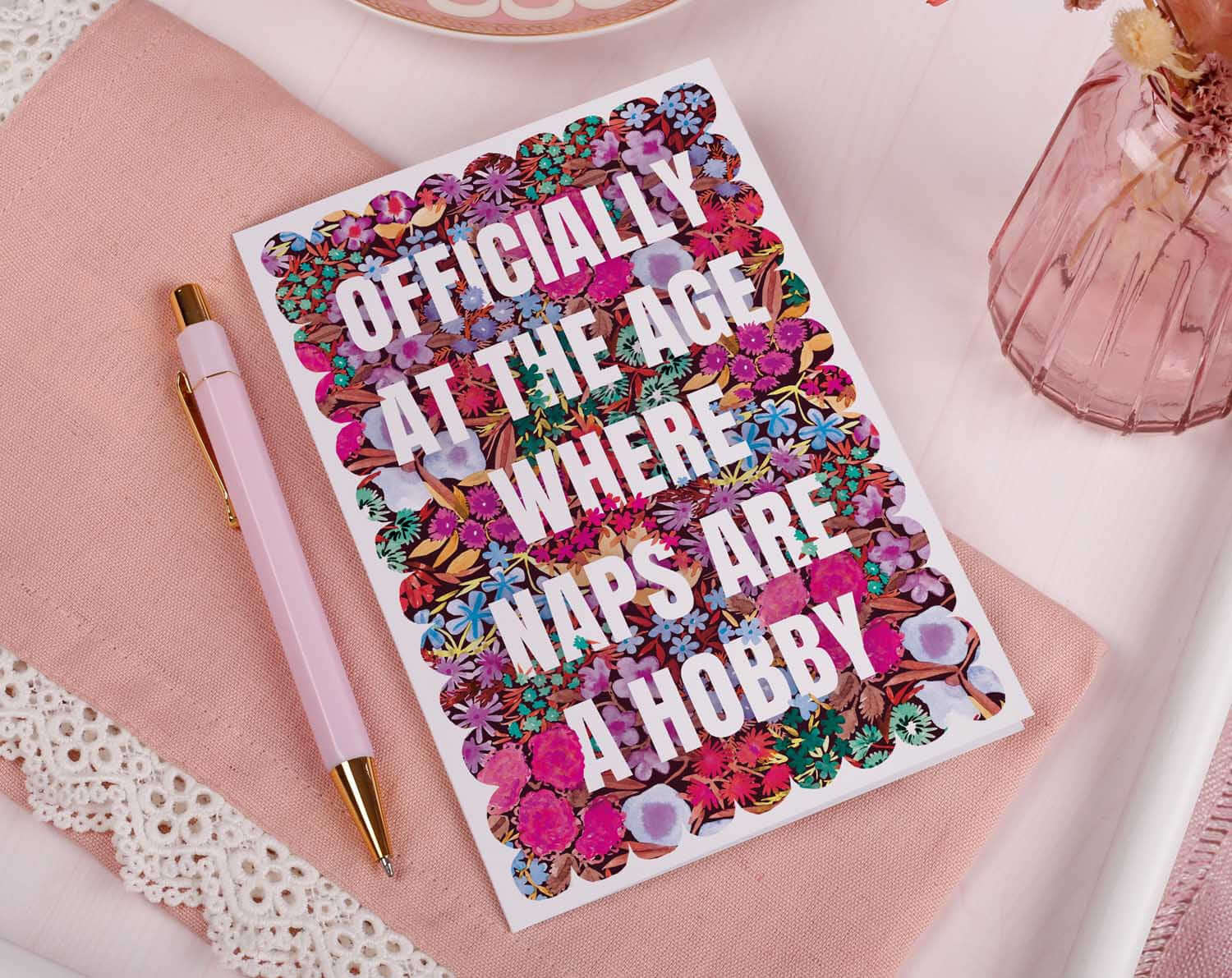 Joke Birthday Card with bold floral design saying 'Officially At The Age Where Naps Are A Hobby'.