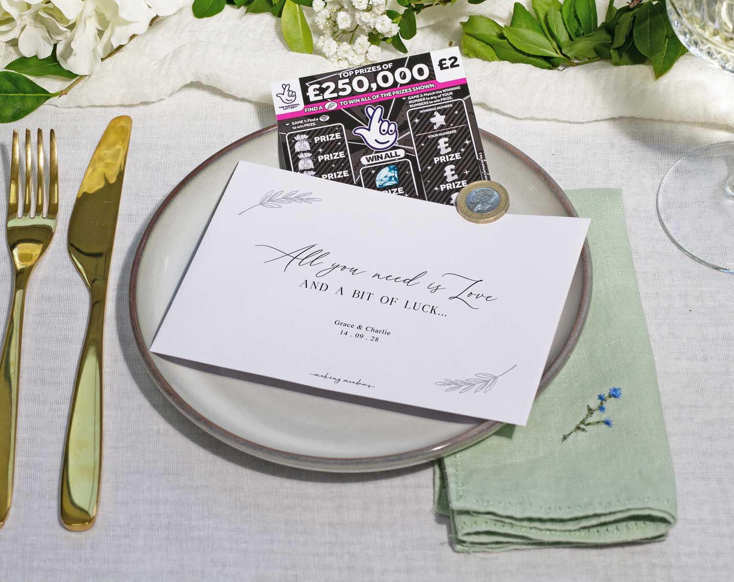 Minimalist Scratch Card Envelopes displayed on a wedding table setting with a scratch card and personalisation.