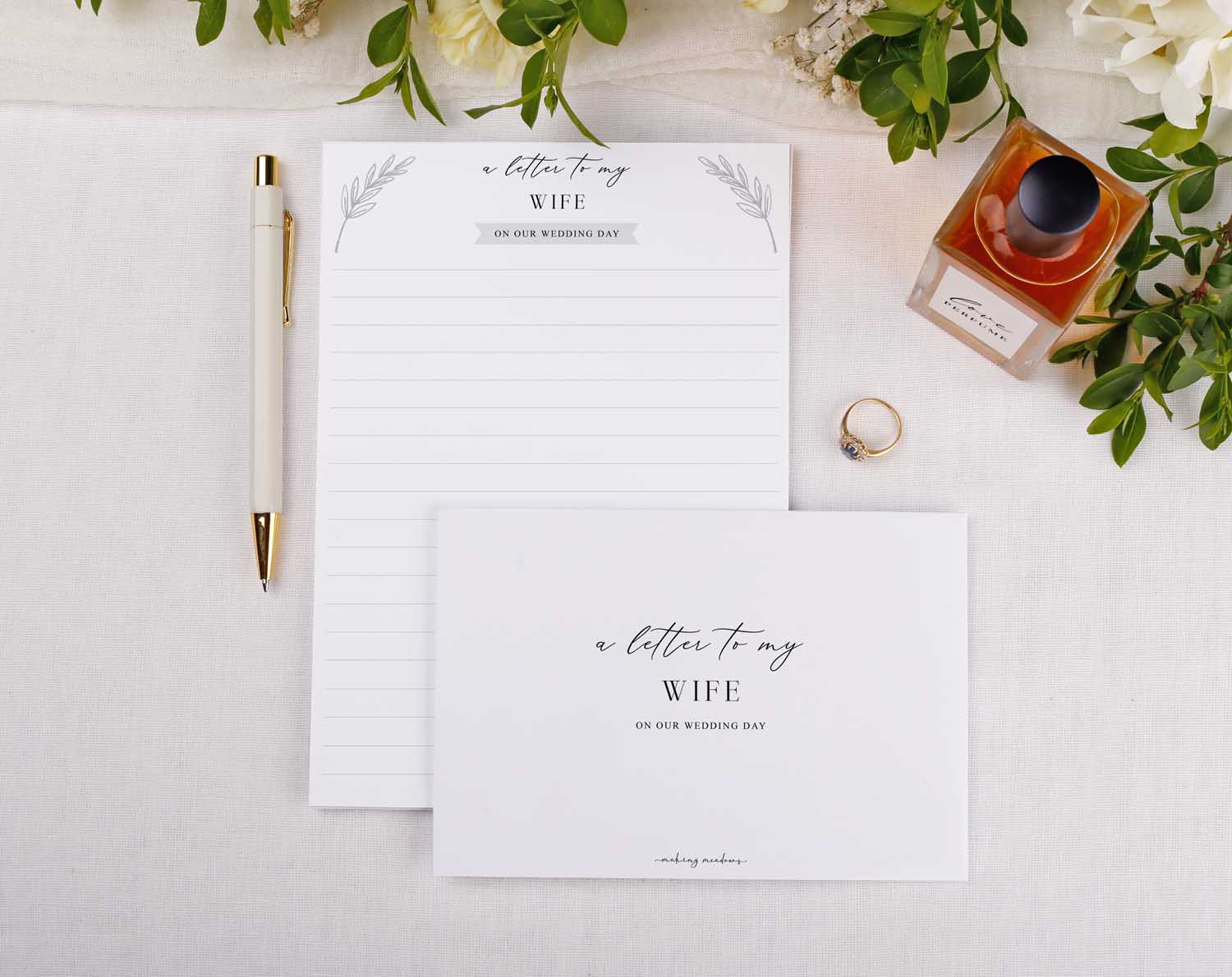 Minimalist Wedding Letter to My Wife stationery set with a pen, letter, and envelope on a table.