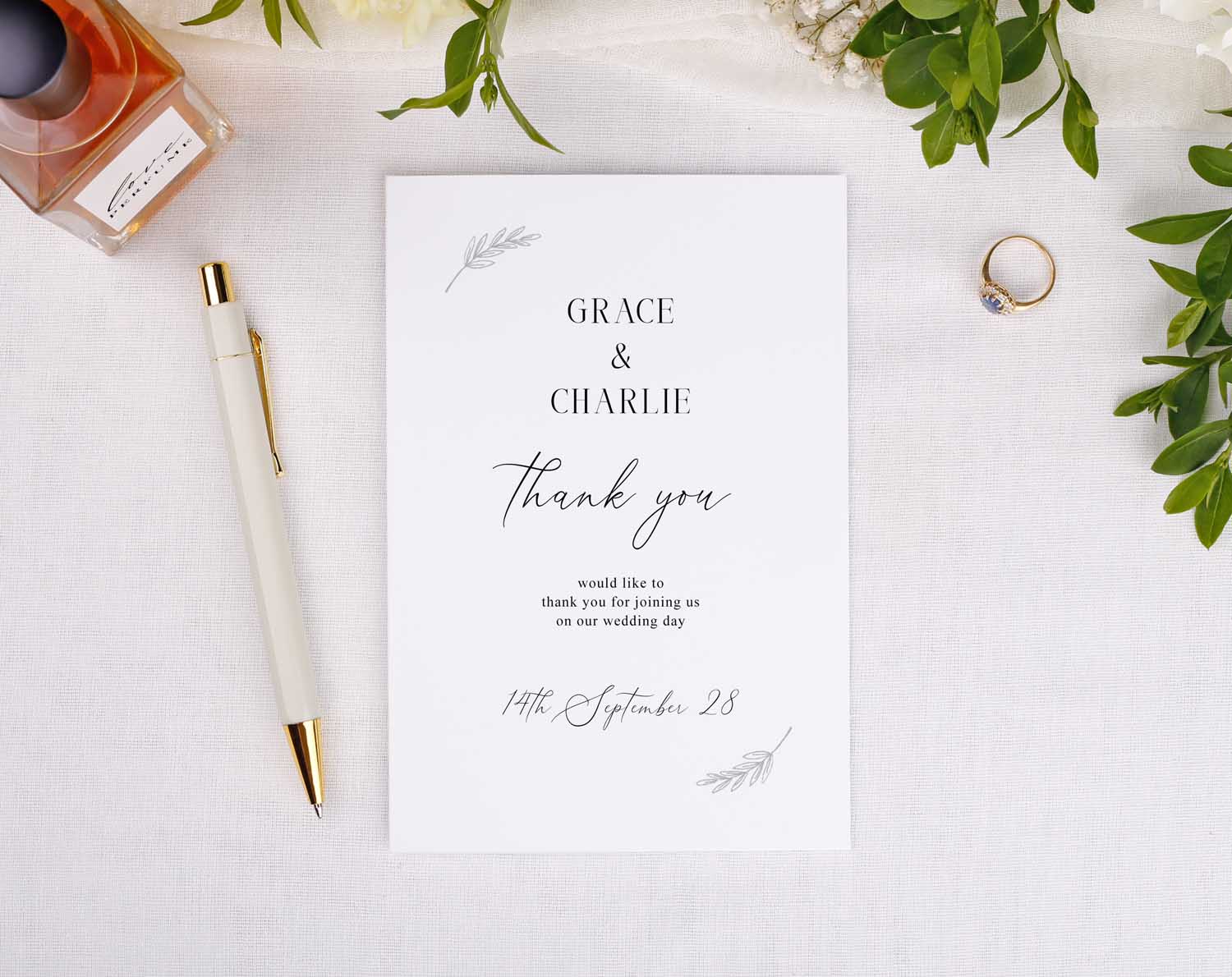 Minimalist Wedding Thank You Cards design featuring elegant text and floral accents.