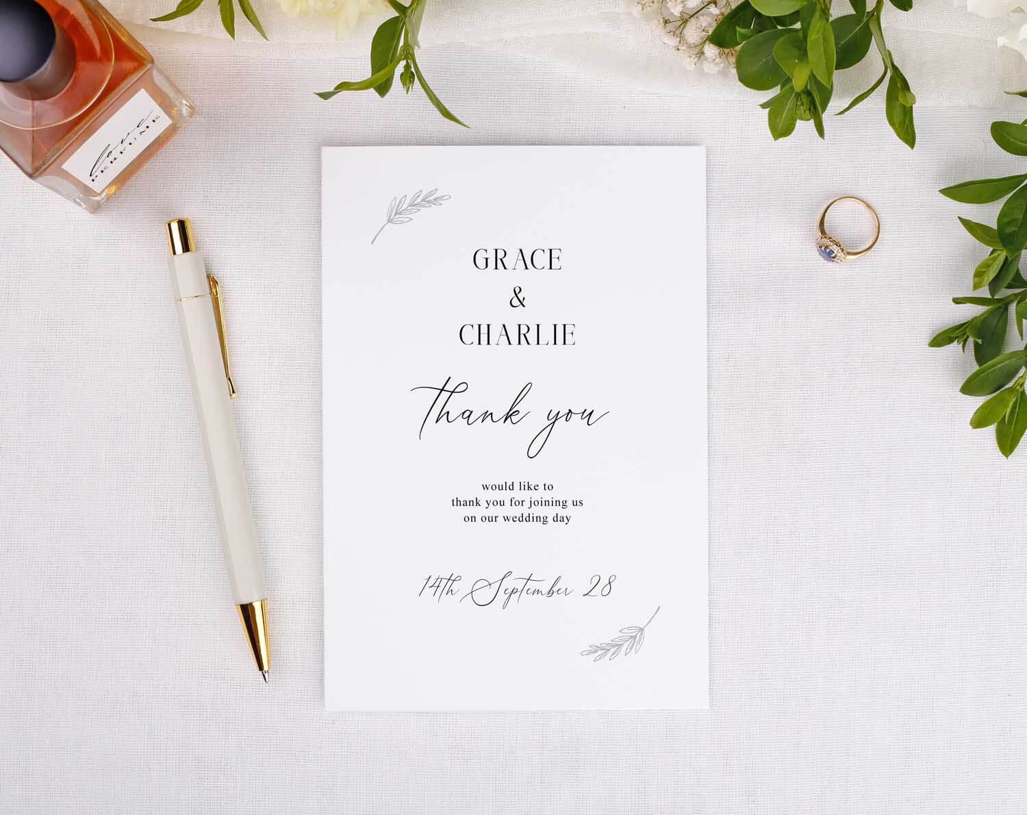 Minimalist Wedding Thank You Cards design featuring elegant text and floral accents.