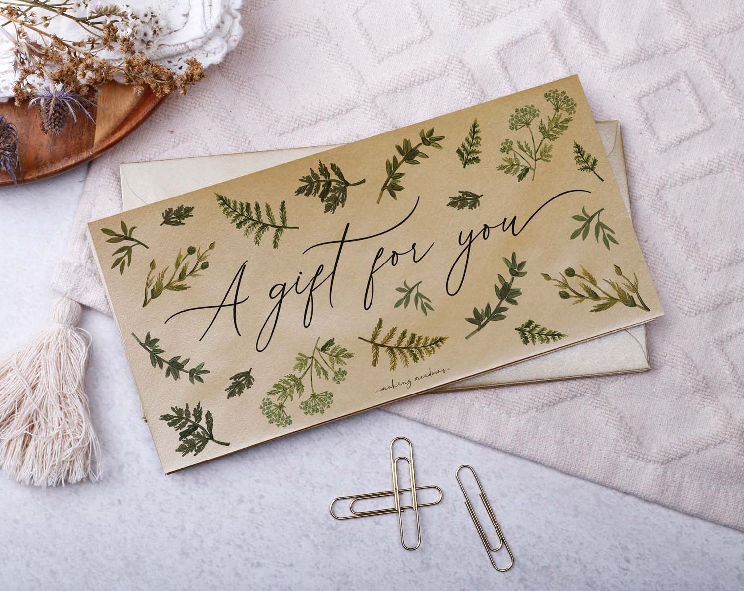 Gift For You Money Envelopes featuring botanical designs and elegant script on a textured surface.