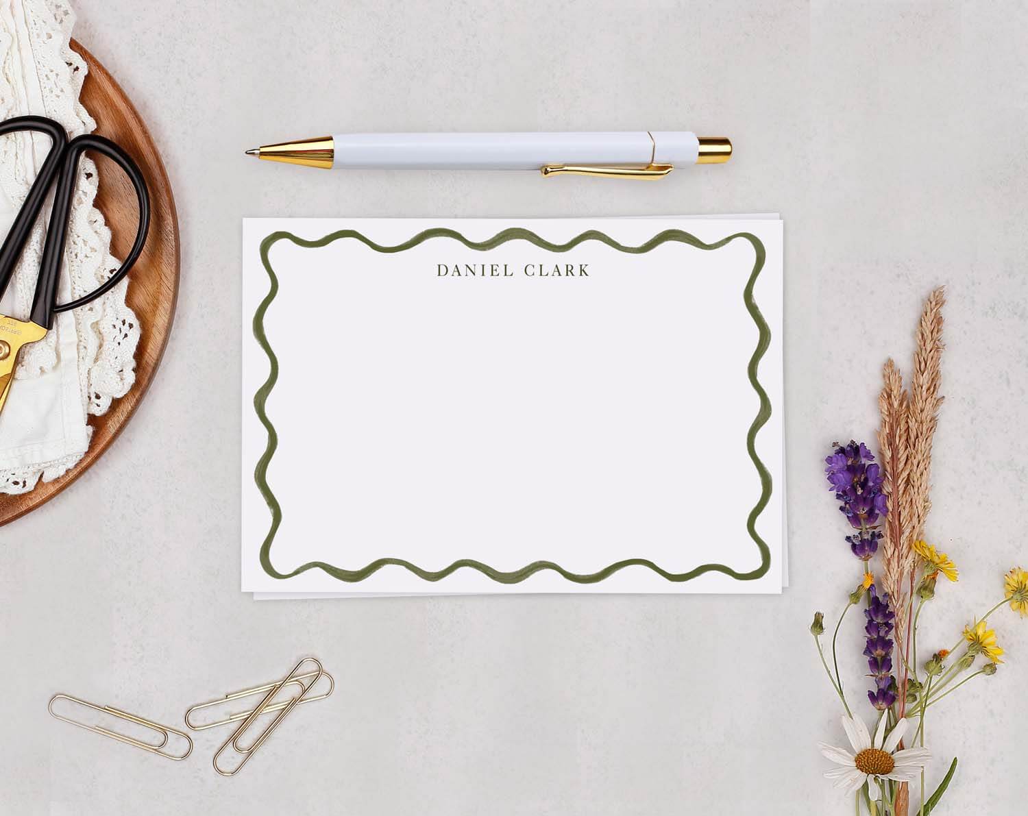 Green Wavy Personalised Note cards featuring a stylish wave border and the name Daniel Clark.