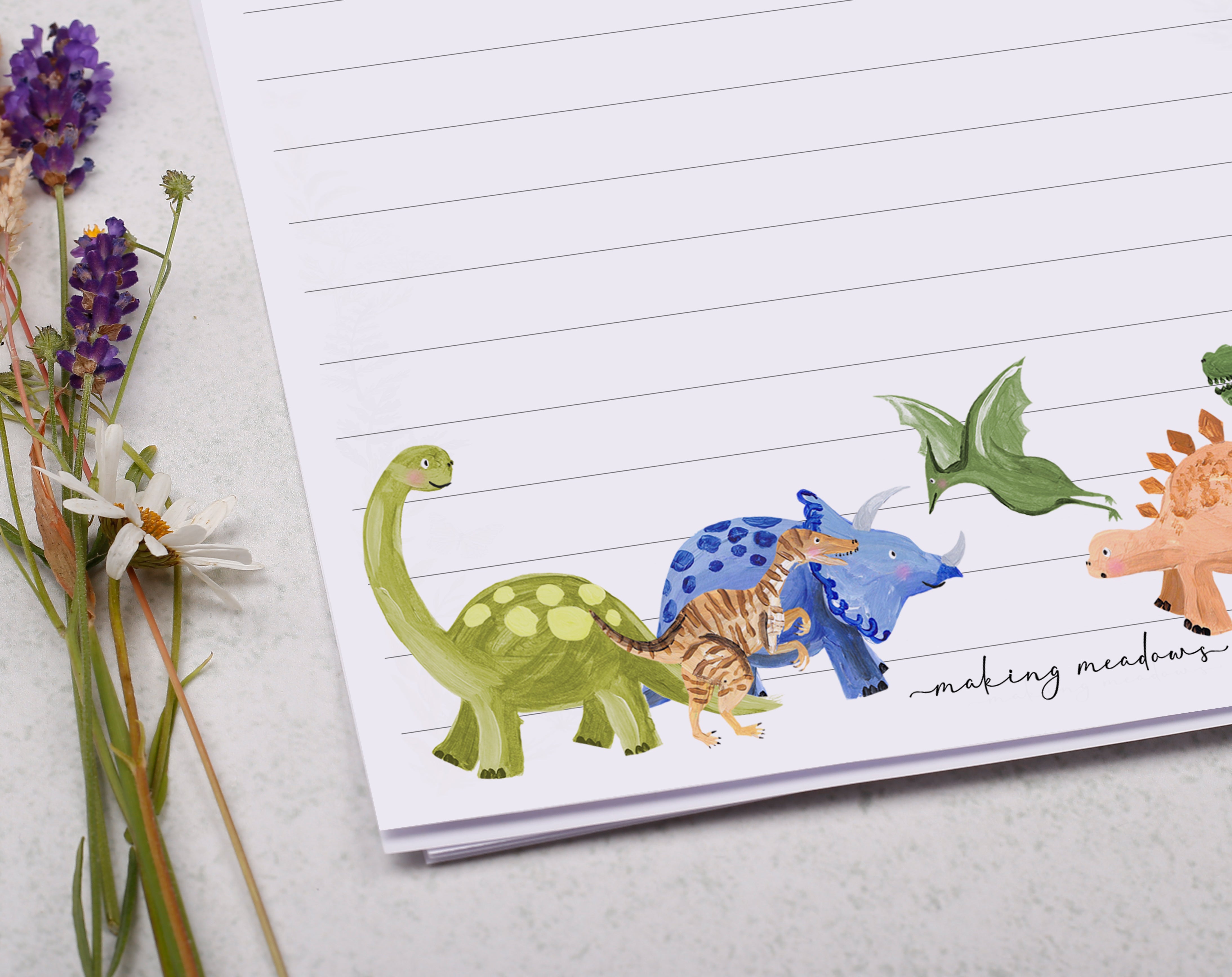 Personalised A5 writing paper with dinosaurs. Stationery designed by Making Meadows