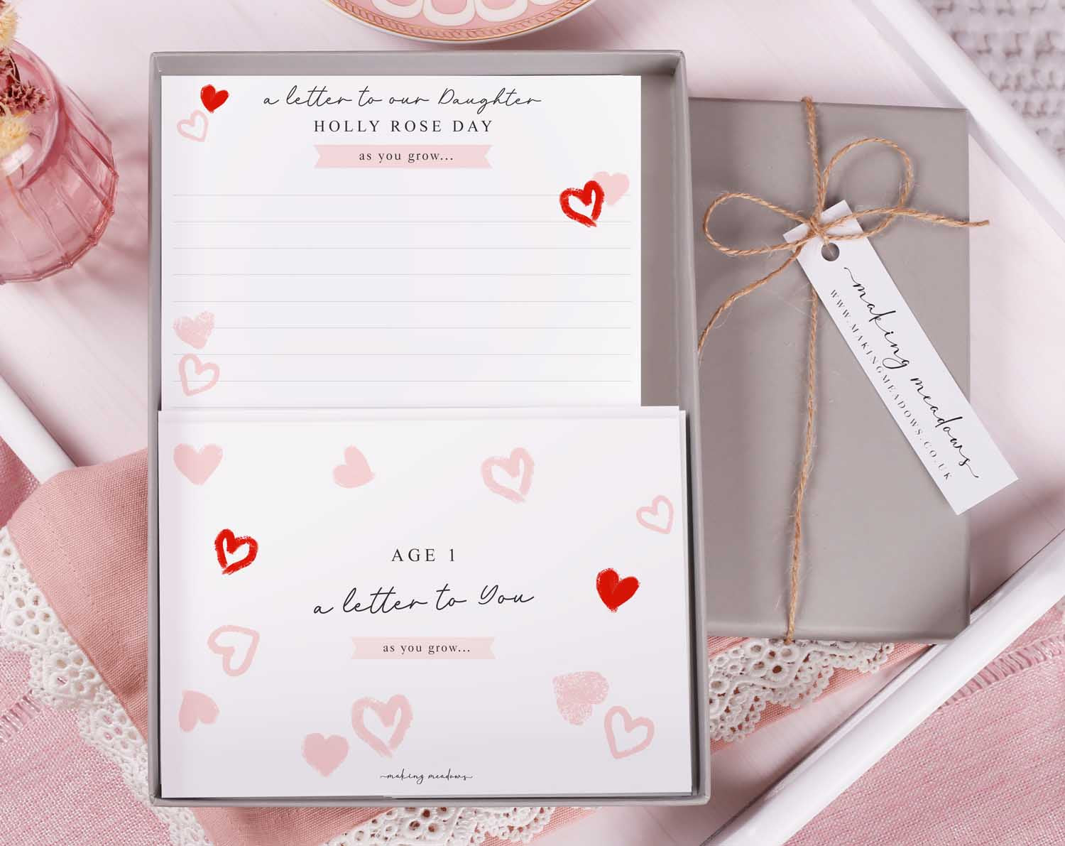Personalised Pink Heart Letter To Our Daughter set with decorative letter writing paper and gift box.