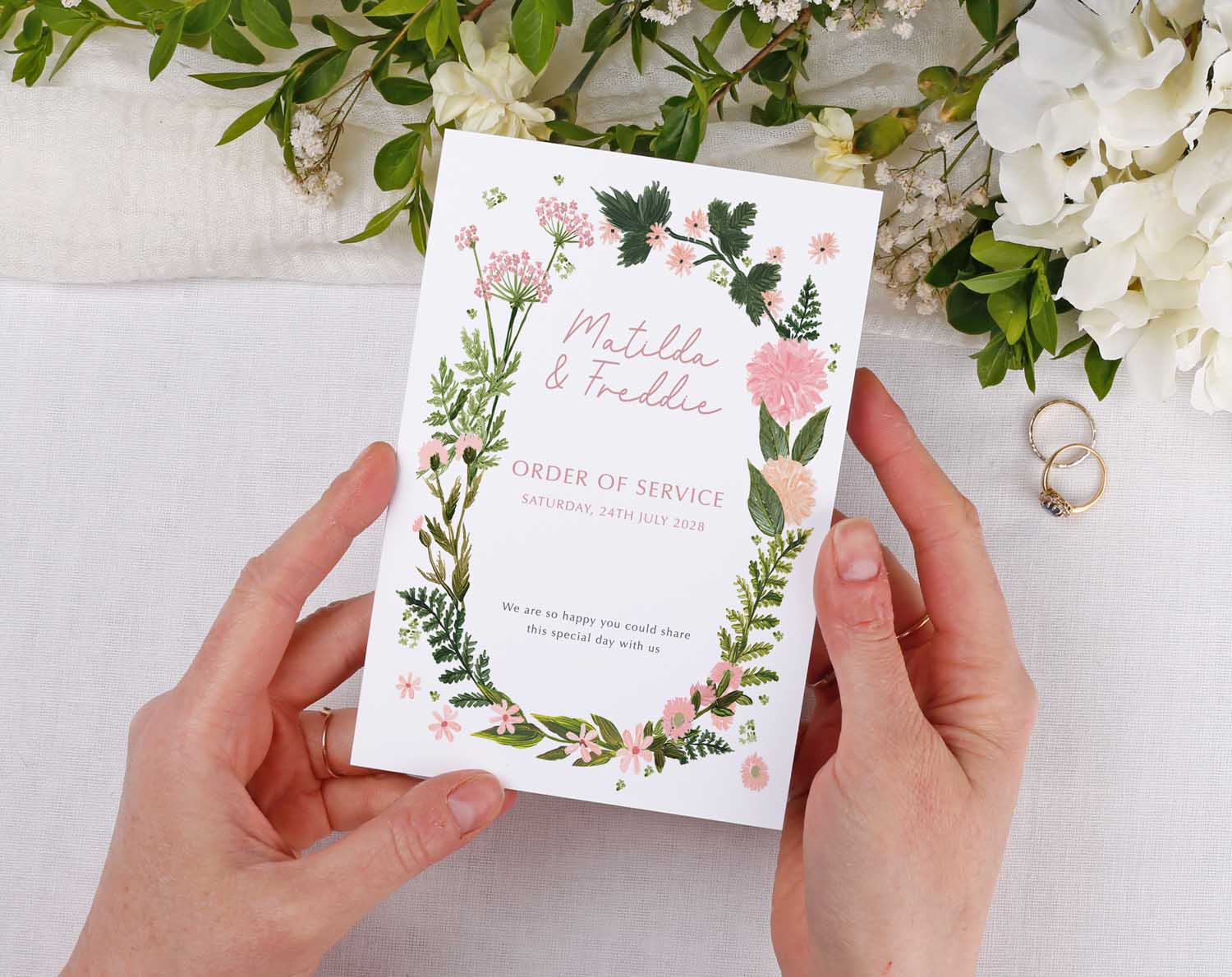 Pink Floral Order Of Service booklet with pink floral design, perfect for wedding ceremony guidance.