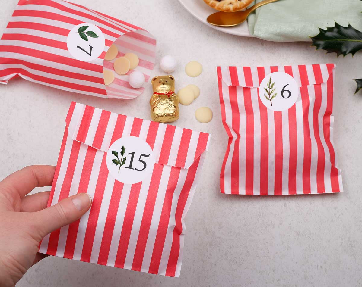 Rustic Christmas Advent Calendar With Red Bags. Advent Calendars designed by Making Meadows