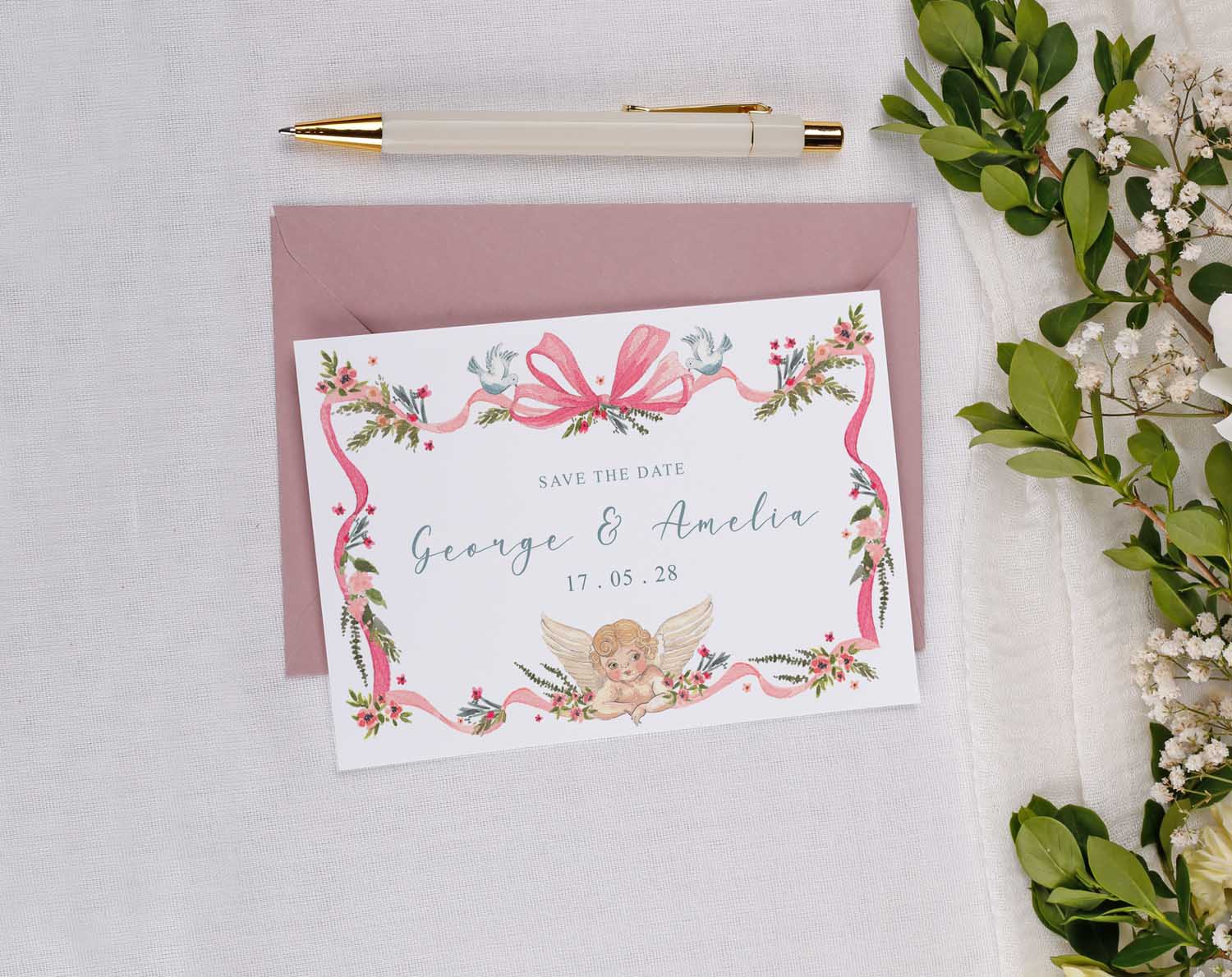 Vintage Wedding Save The Date card featuring floral design, angel illustration, and personalized names.